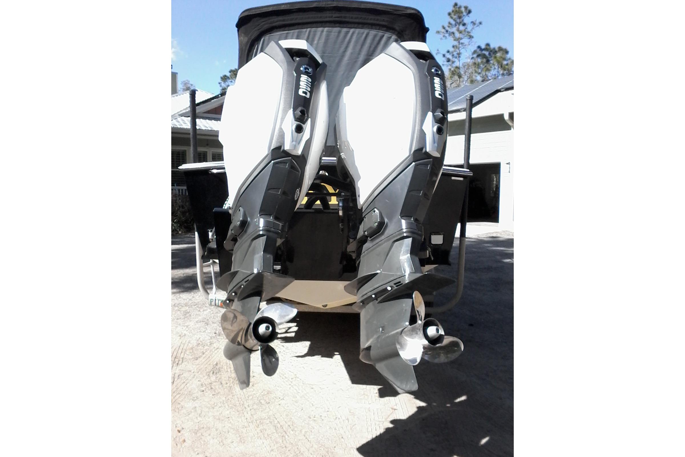 Twin outboard engines on a 2002 Albemarle 265 Express Fisherman boat.