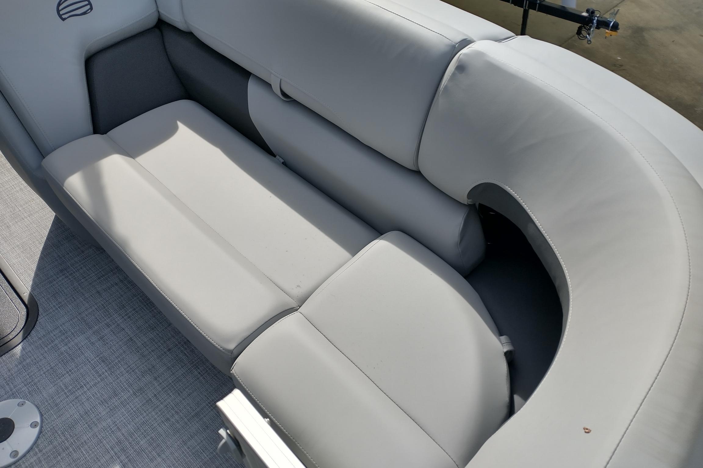 2026 Sun Tracker Party Barge 22 XP3, featuring comfortable gray seating.