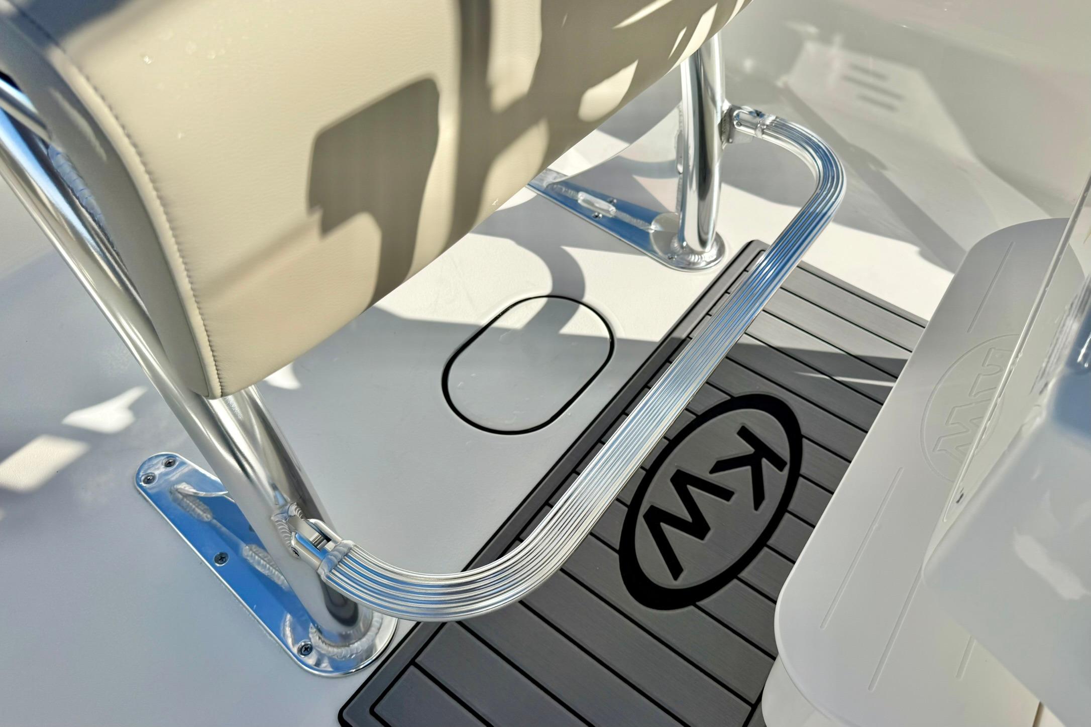 2026 Key West 189 FS boat interior with chrome details and KW logo mat.