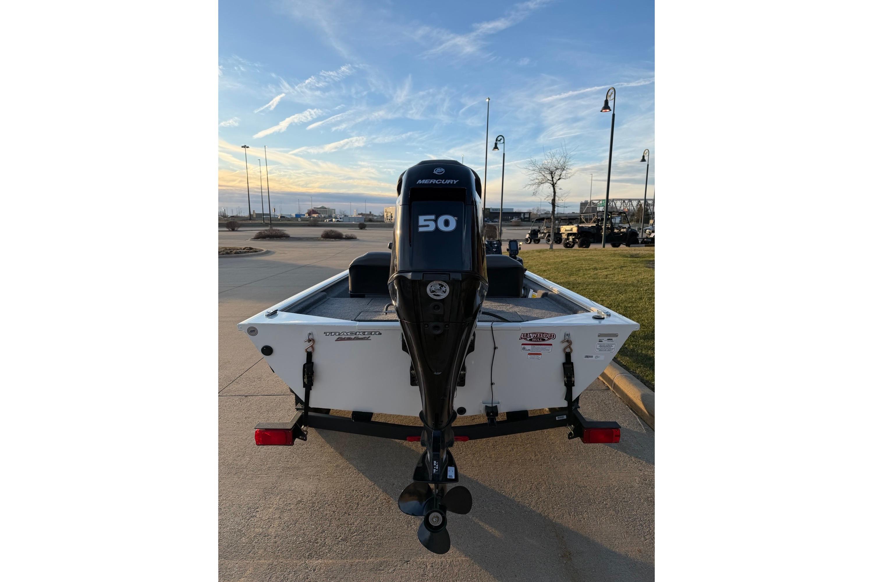 2026 Tracker Pro 170 boat with Mercury 50 engine, parked outdoors.