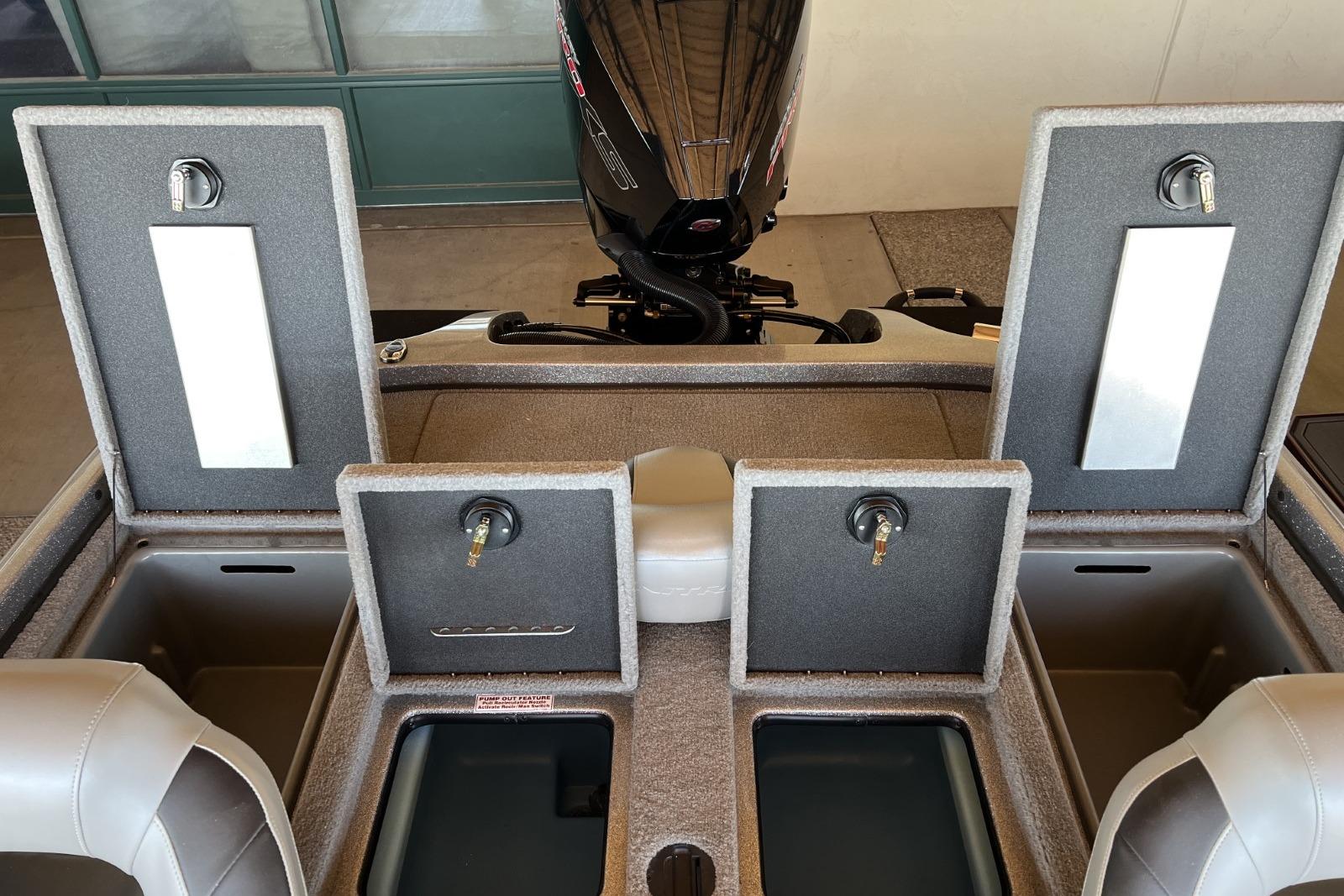 2025 Nitro Z19 boat storage compartments and engine, showcasing interior design and functionality.