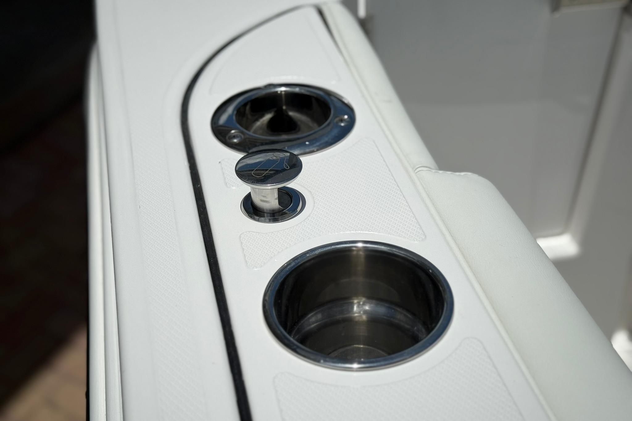 Edgewater 250CC 2026 boat console with cup holders and sleek design.