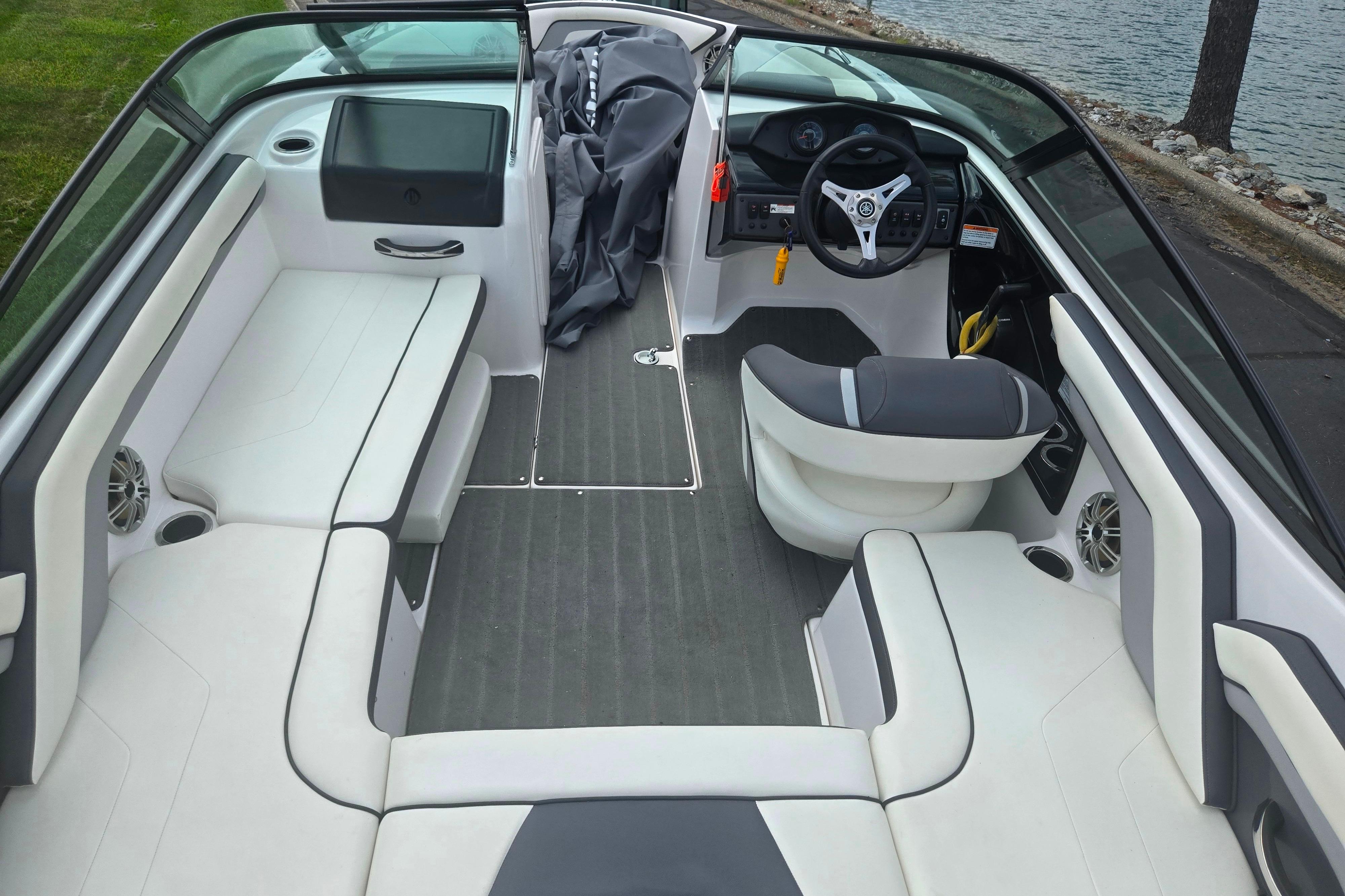 Interior of a 2016 Yamaha Boats AR192, featuring sleek seating and modern controls.