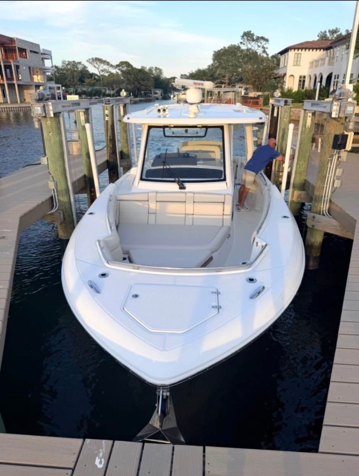 2019 Boston Whaler 350 Realm at dock, front view.