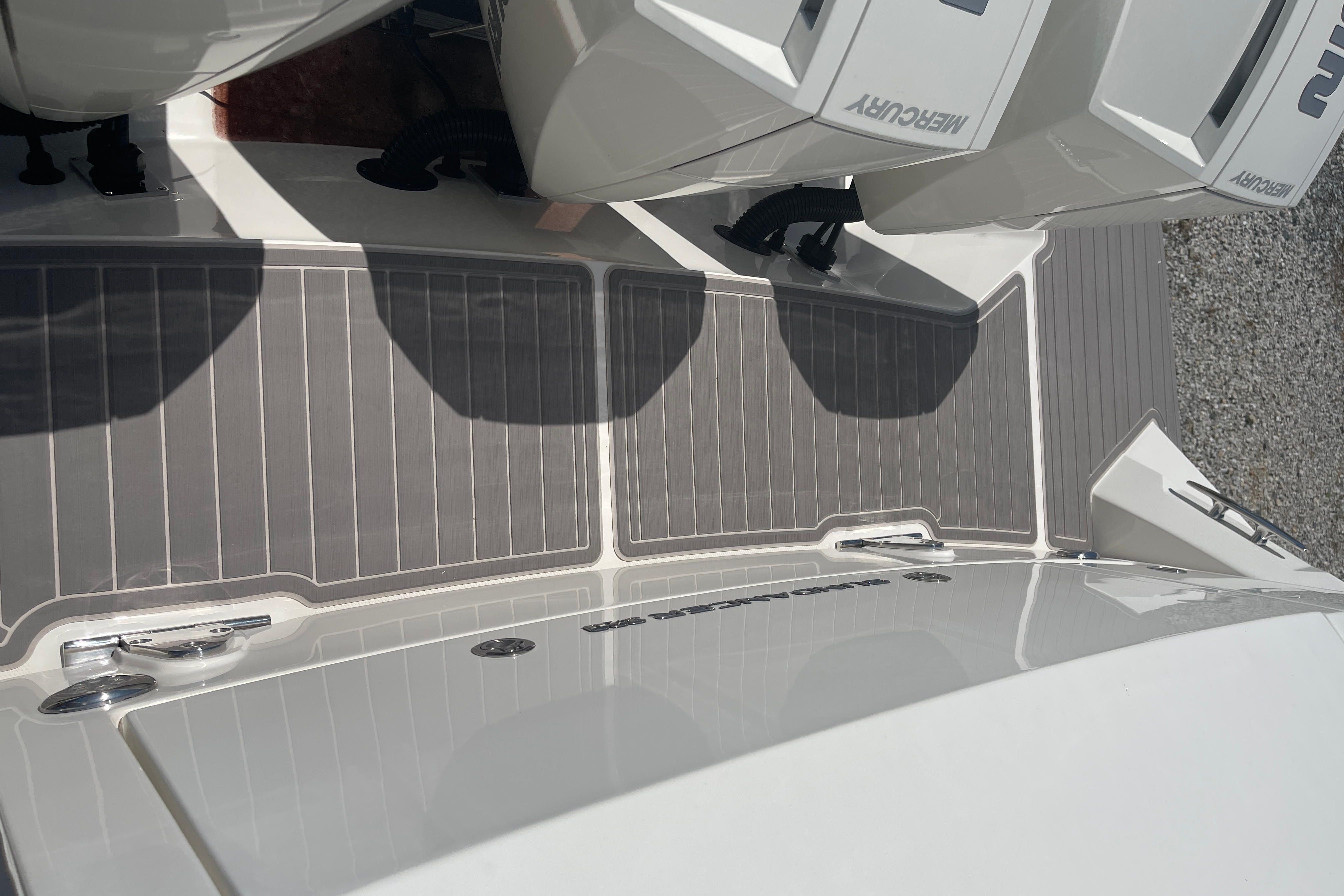 2023 Sea Ray Sundancer 320 Outboard with Mercury engines, deck view.