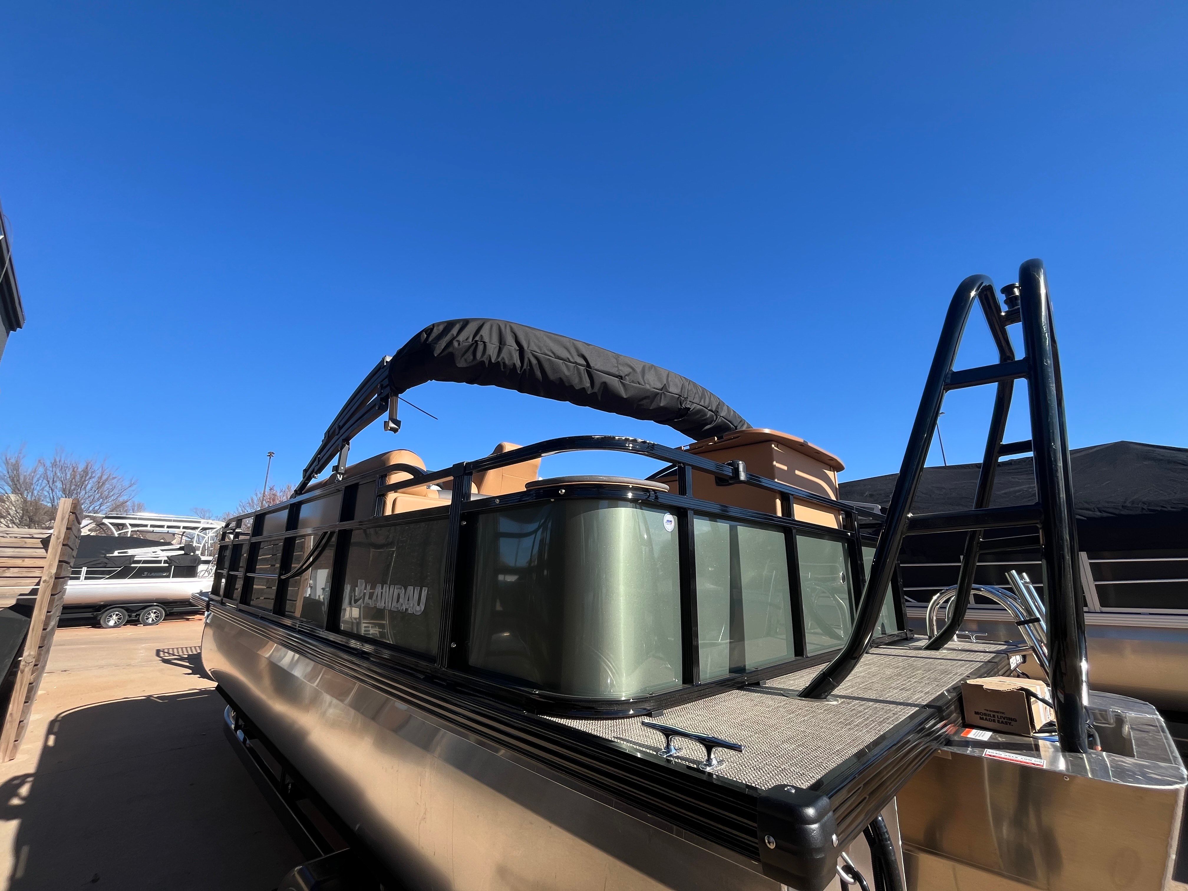 2026 Landau Alure 21CC Fish boat outdoors under clear blue sky.