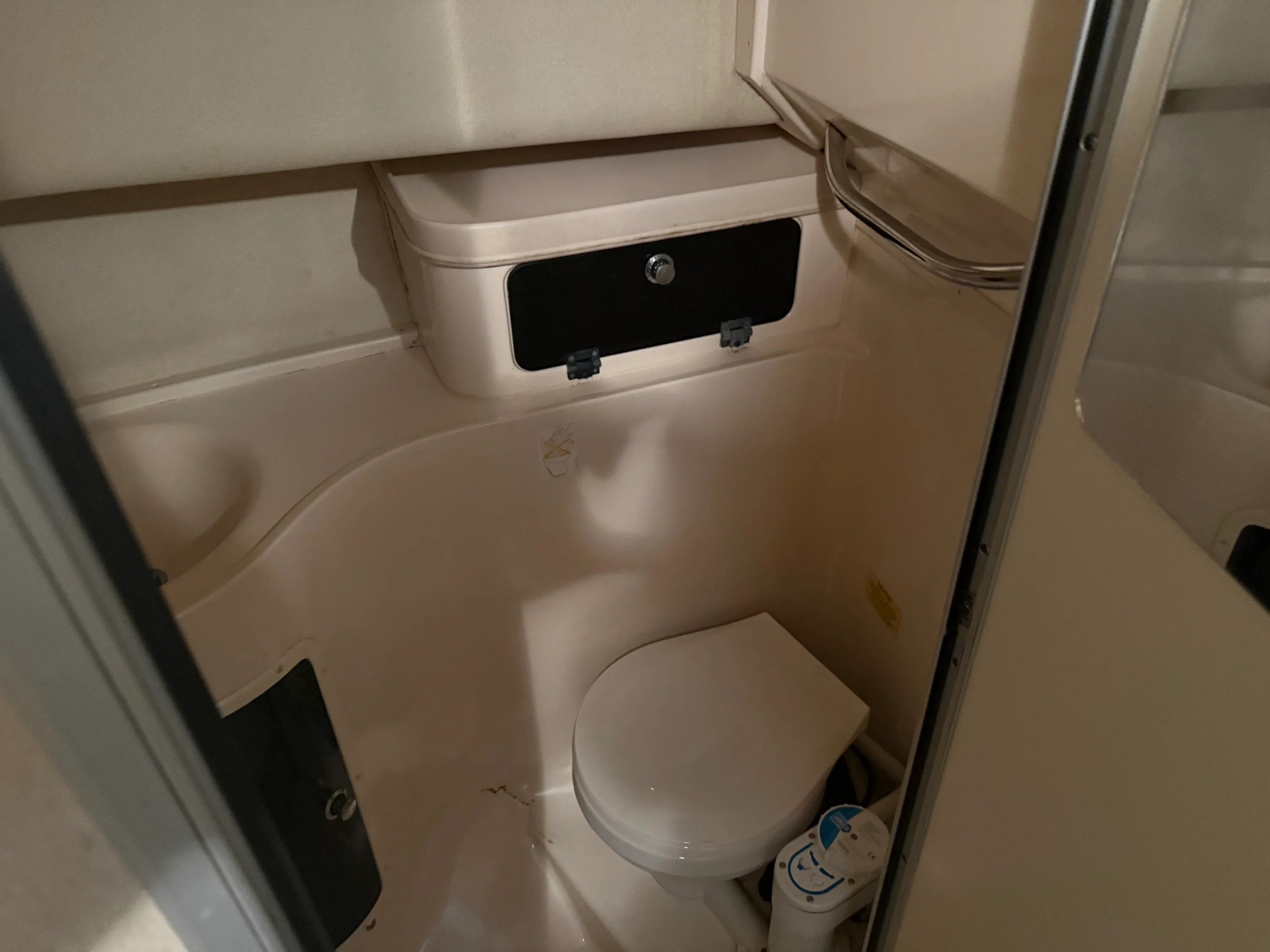 Interior of a Grady-White Marlin 300 yacht, bathroom view.