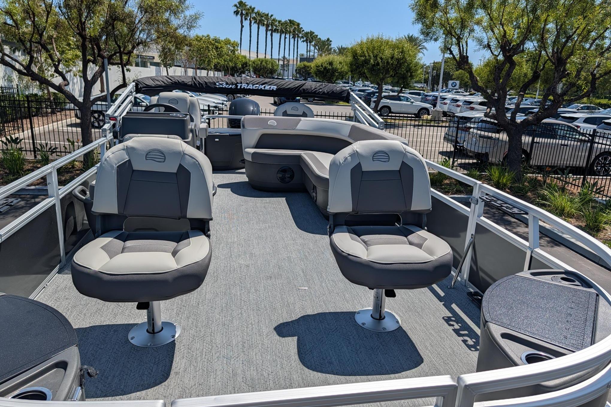 2026 Sun Tracker Bass Buggy 18 DLX pontoon boat with spacious seating and modern design.