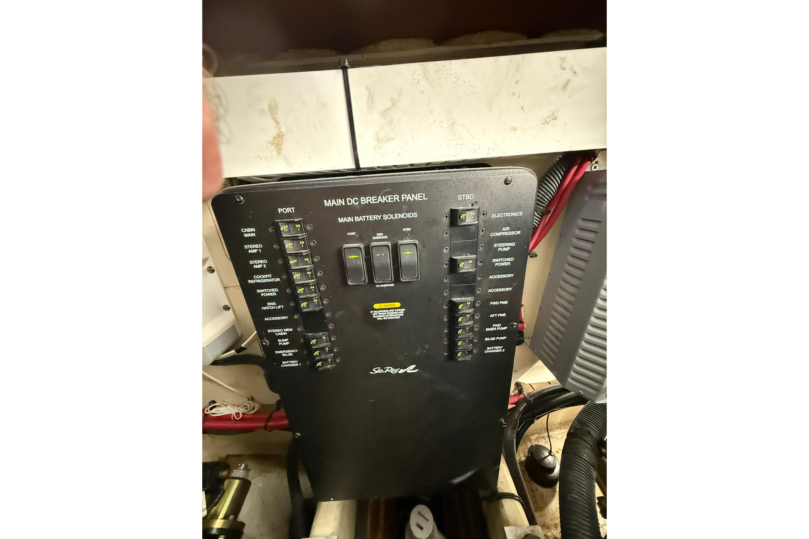 Main DC breaker panel on 2009 Sea Ray 350 Sundancer boat, featuring various switches and controls.