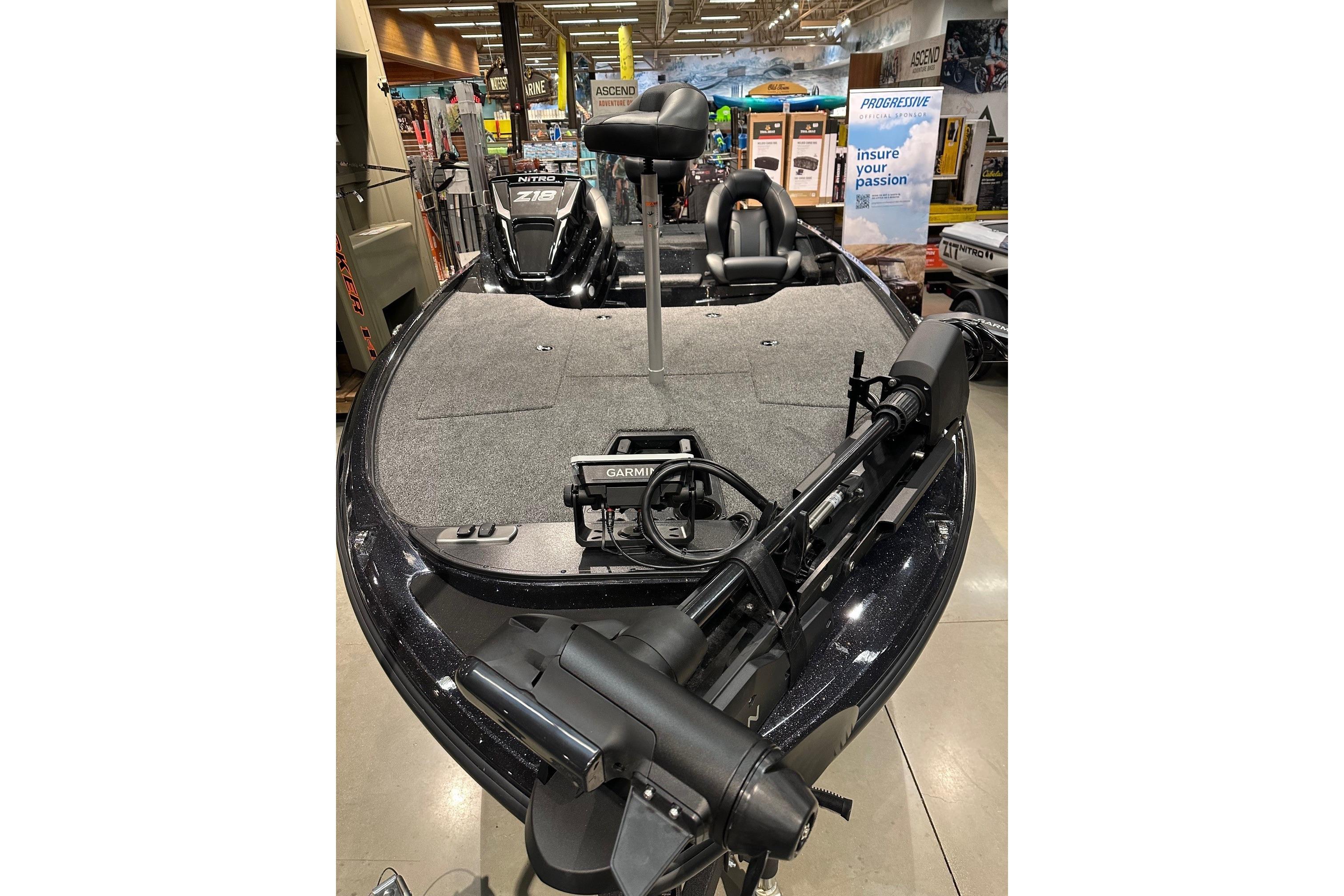 2026 Nitro Z18 Pro fishing boat with Garmin equipment on display in showroom.