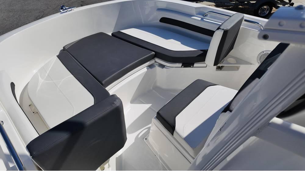 2025 Bayliner Trophy 20 boat interior with cushioned seating and sleek design.