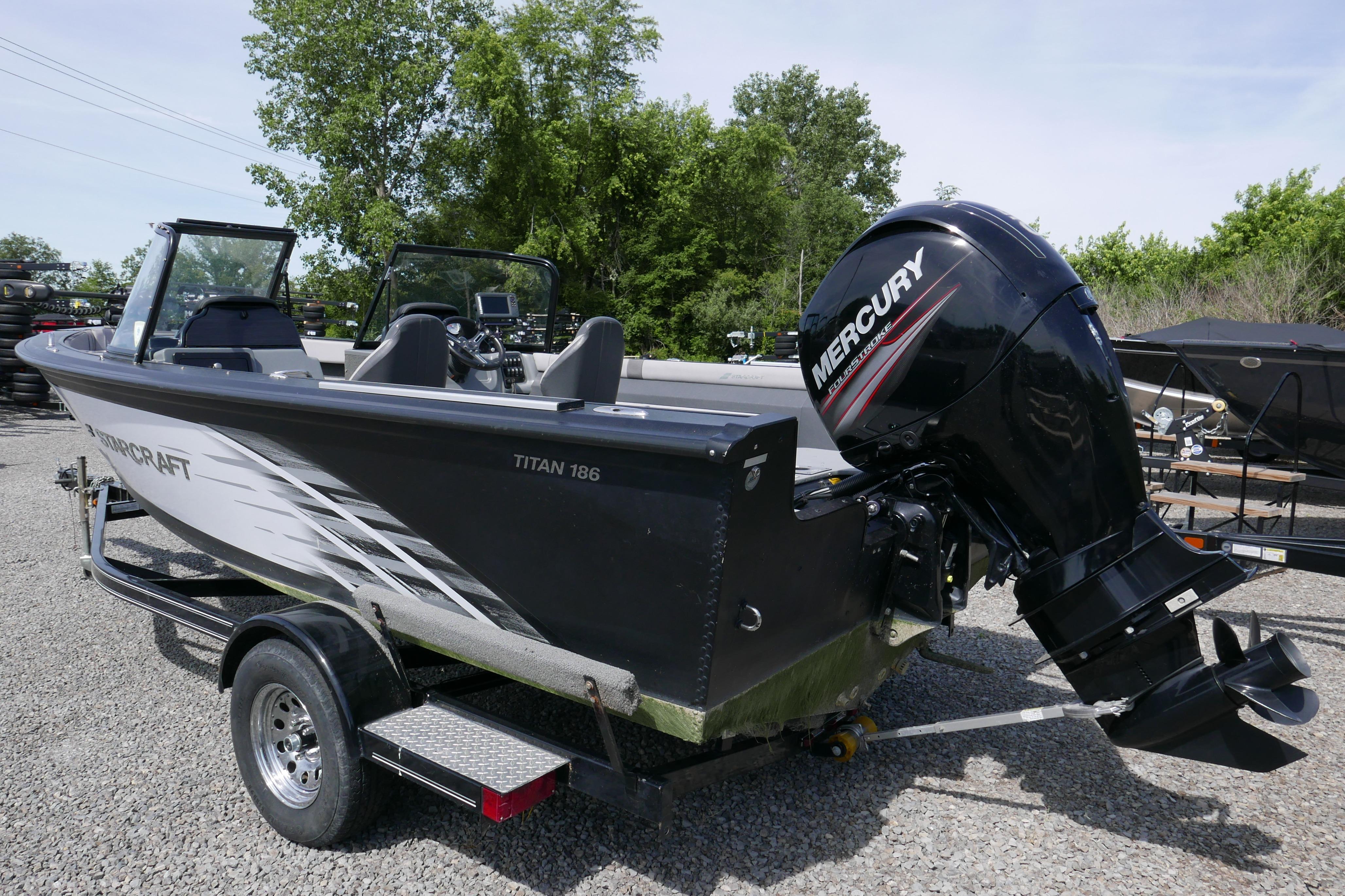 2016 Starcraft Titan 186 boat with Mercury outboard motor on trailer.