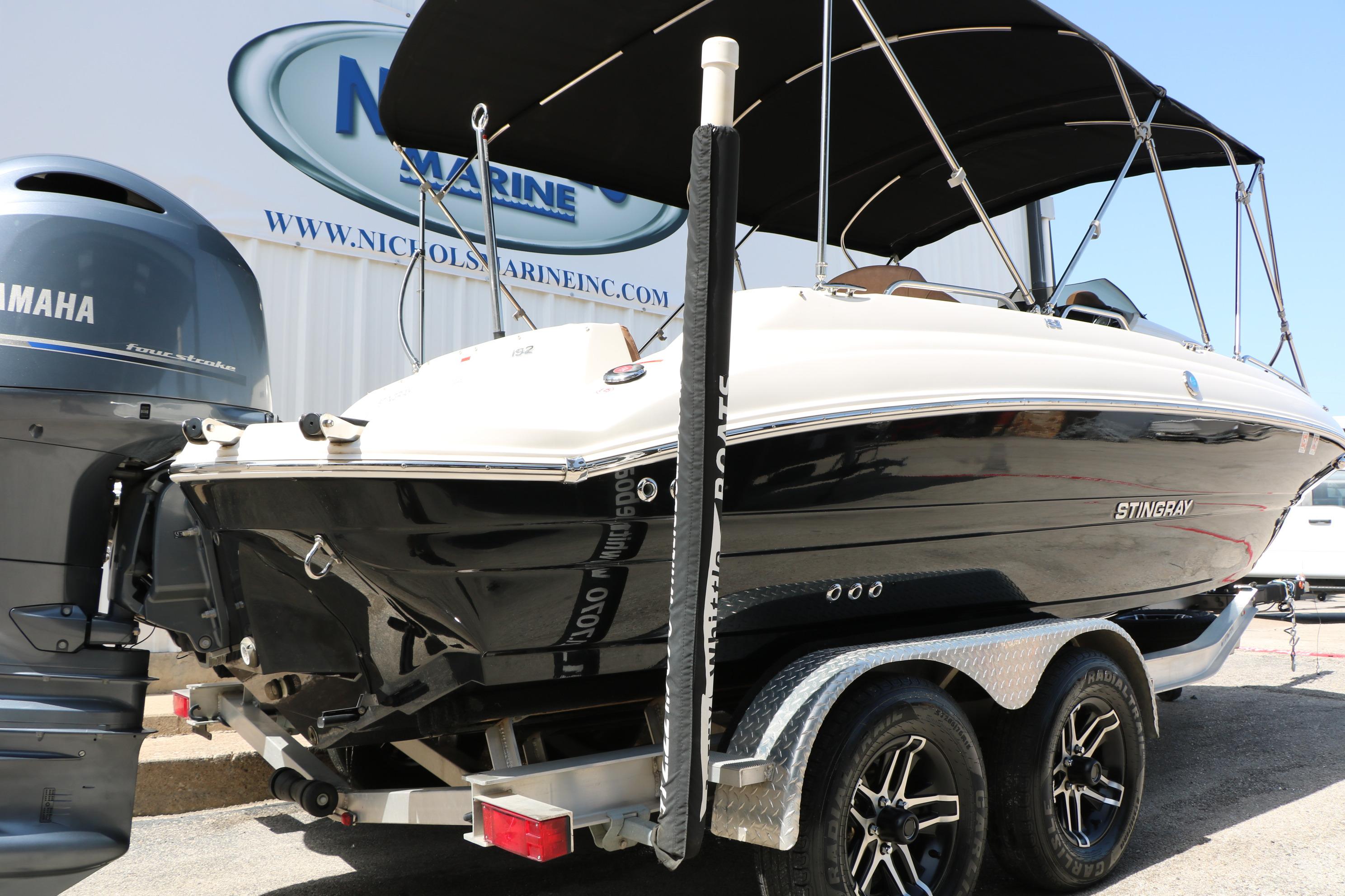 2022 Stingray 192 SC boat on trailer with Yamaha outboard motor.