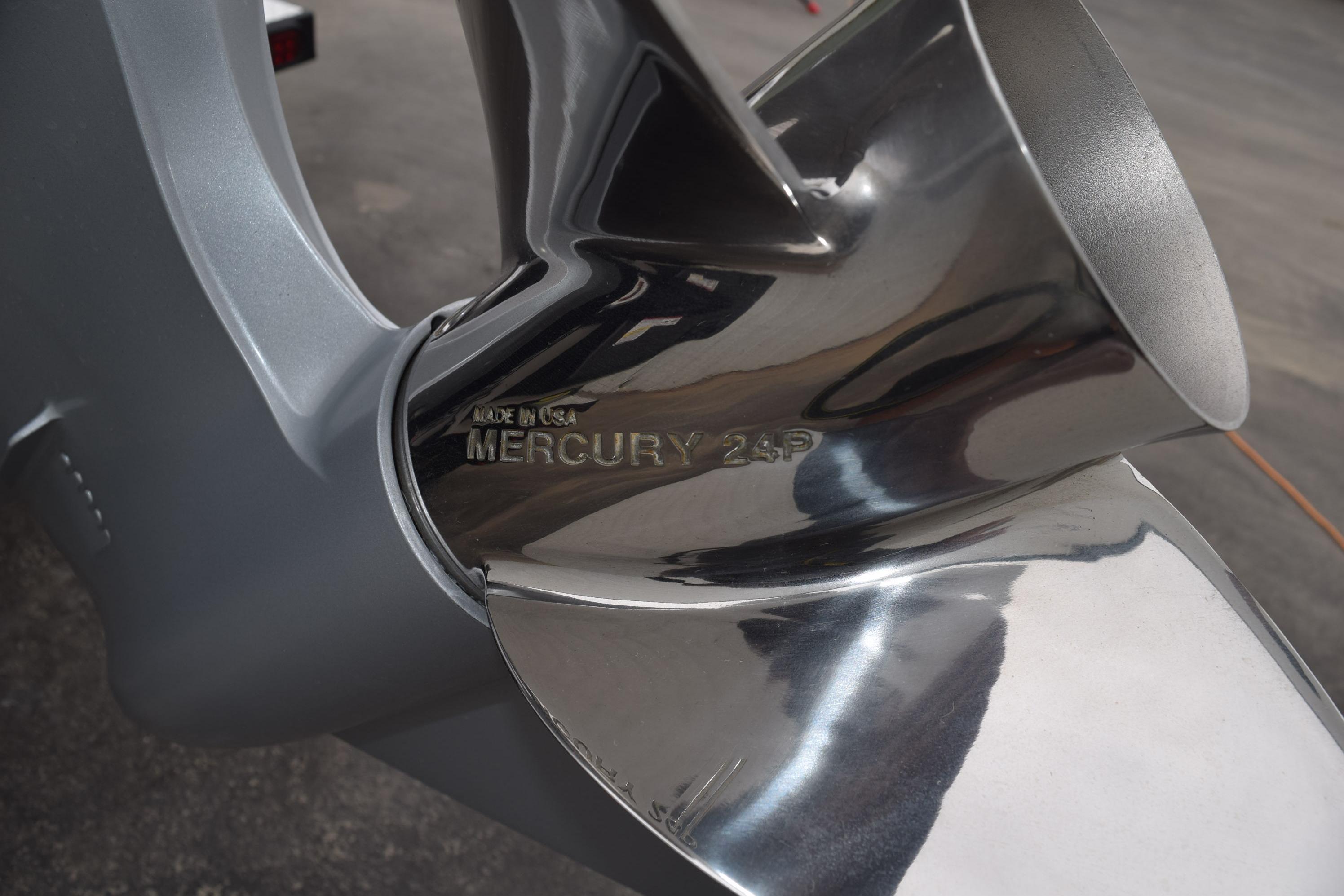 Close-up of a Mercury 24P propeller on a 2027 Cayams CX 20 PRo boat.