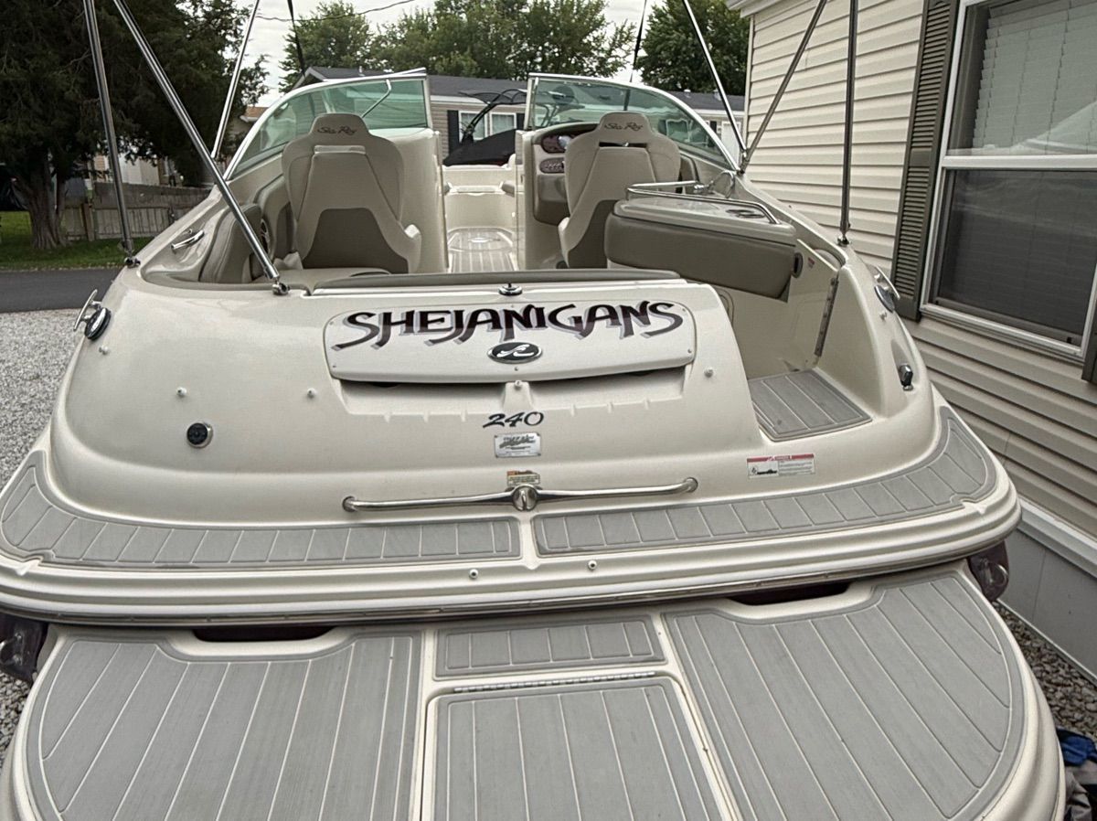 The image shows a 2007 Sea Ray 240 Sundeck boat named "Shejanigans" at the stern.