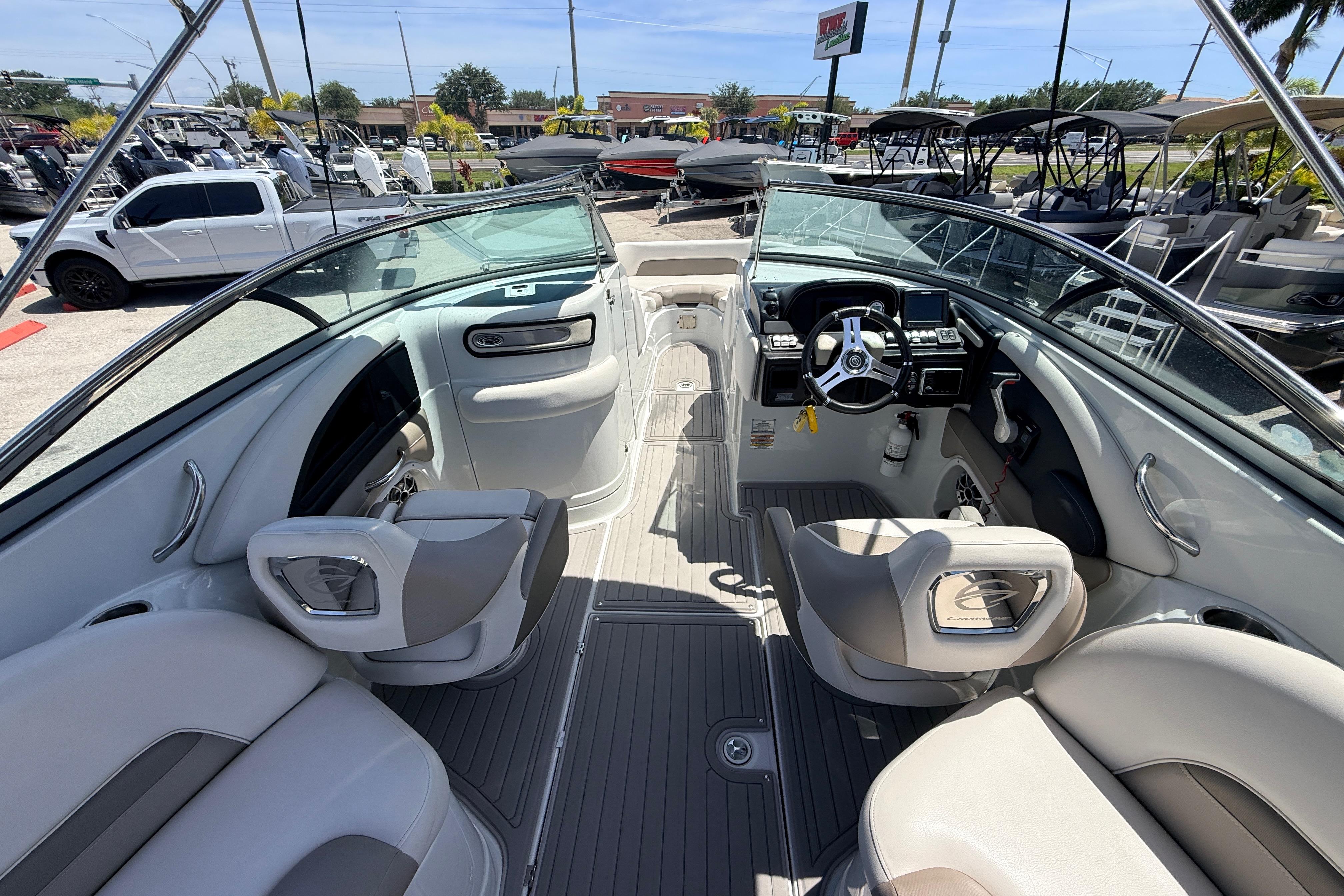 2018 Crownline Eclipse E26 XS boat interior with modern seating and steering console.