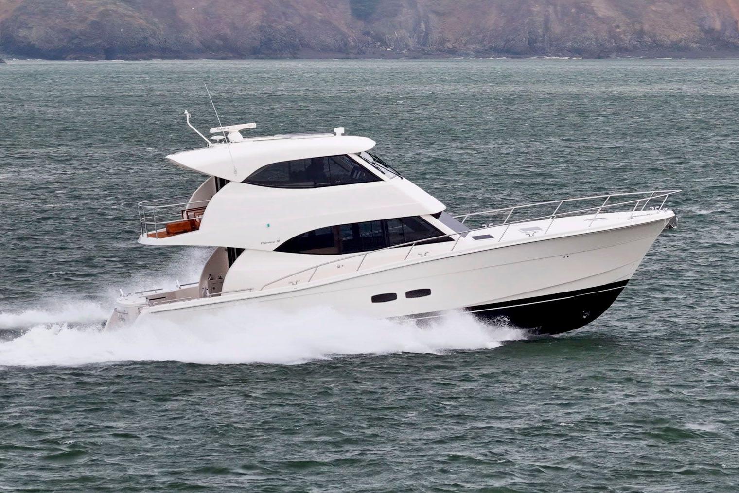 2014 Maritimo M50 yacht cruising on open water, showcasing sleek design and performance.
