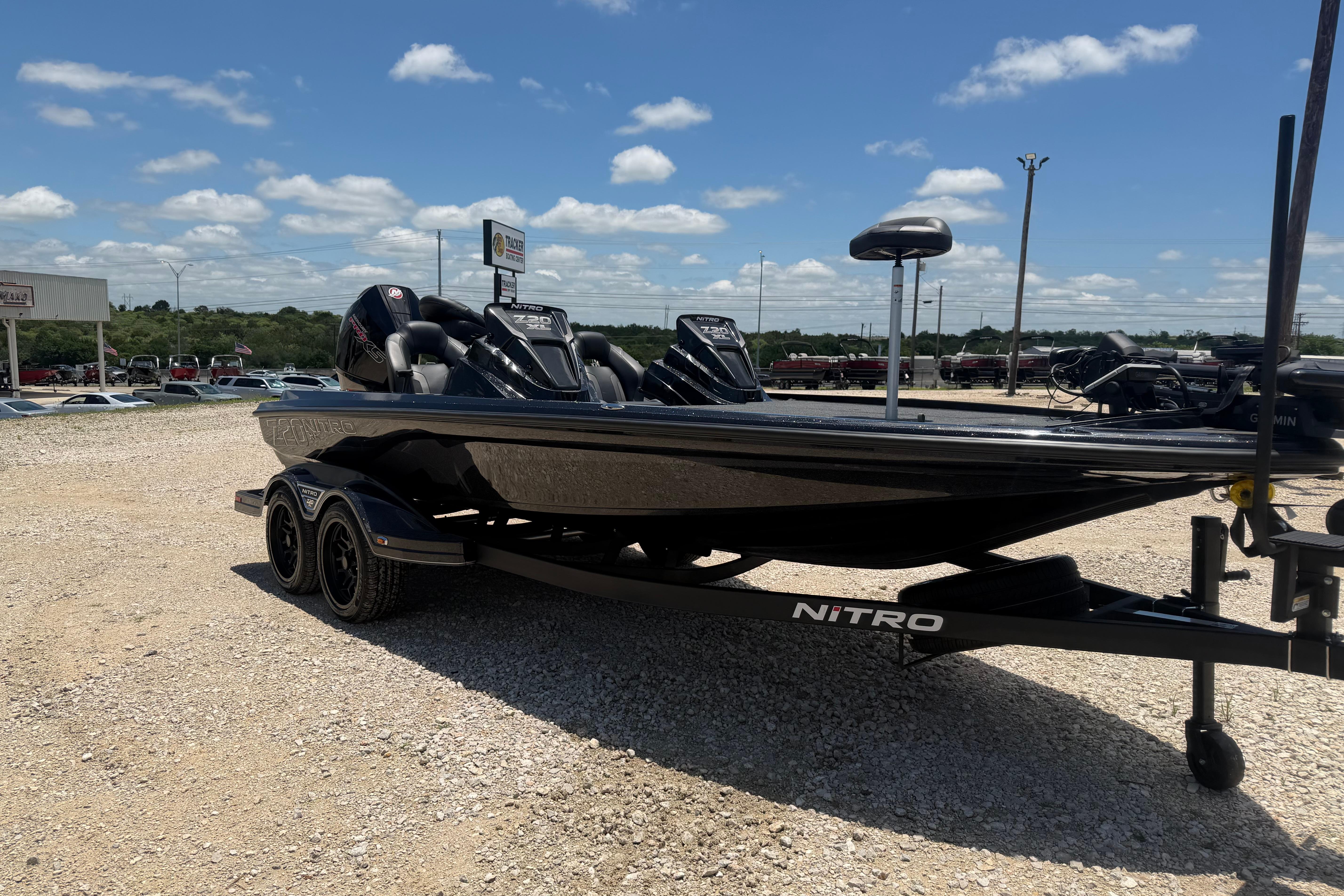 2026 Nitro Z20 XL Pro boat on trailer under clear blue sky.