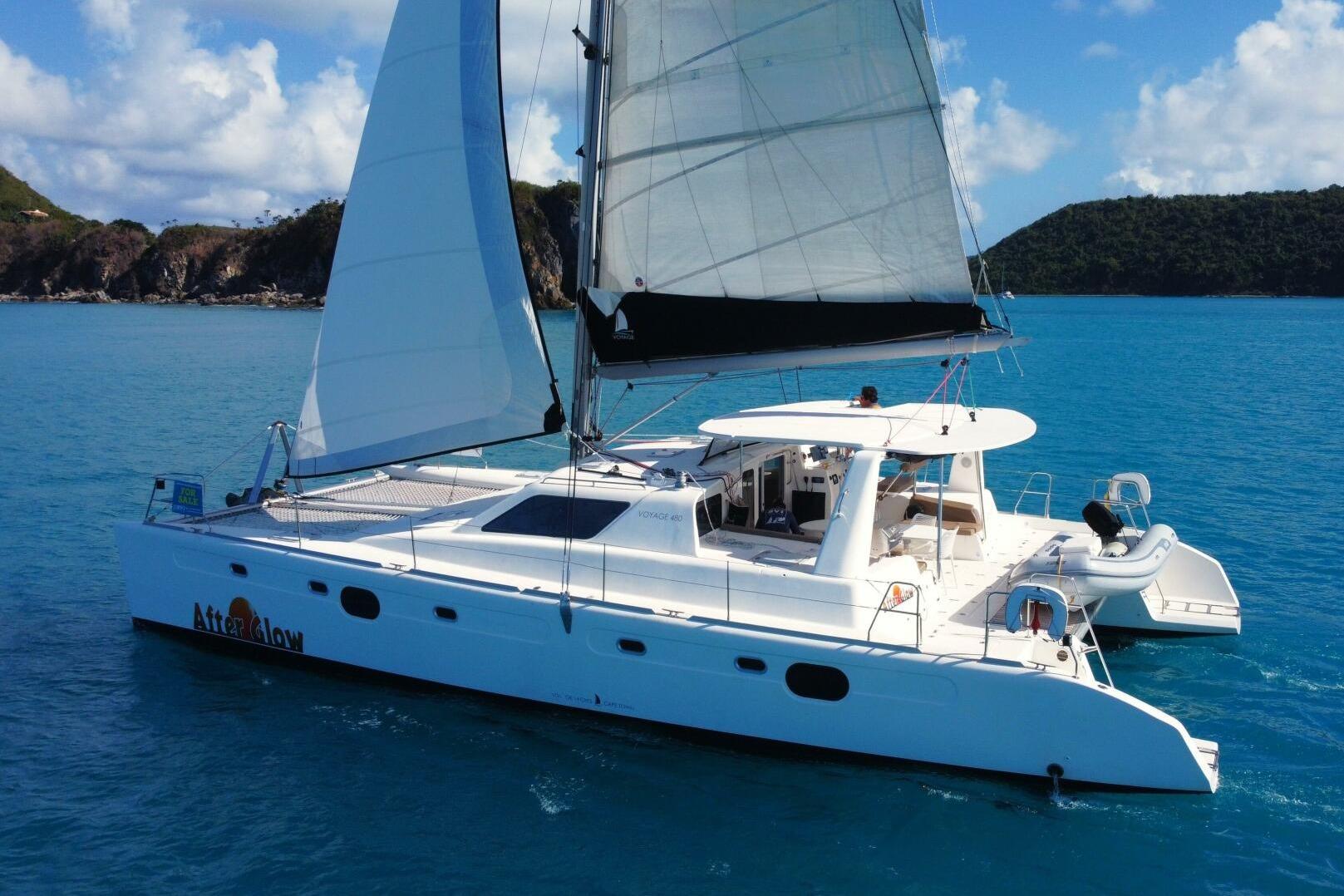 Sailing catamaran Voyage 480, 2017 model, cruising in clear blue waters.