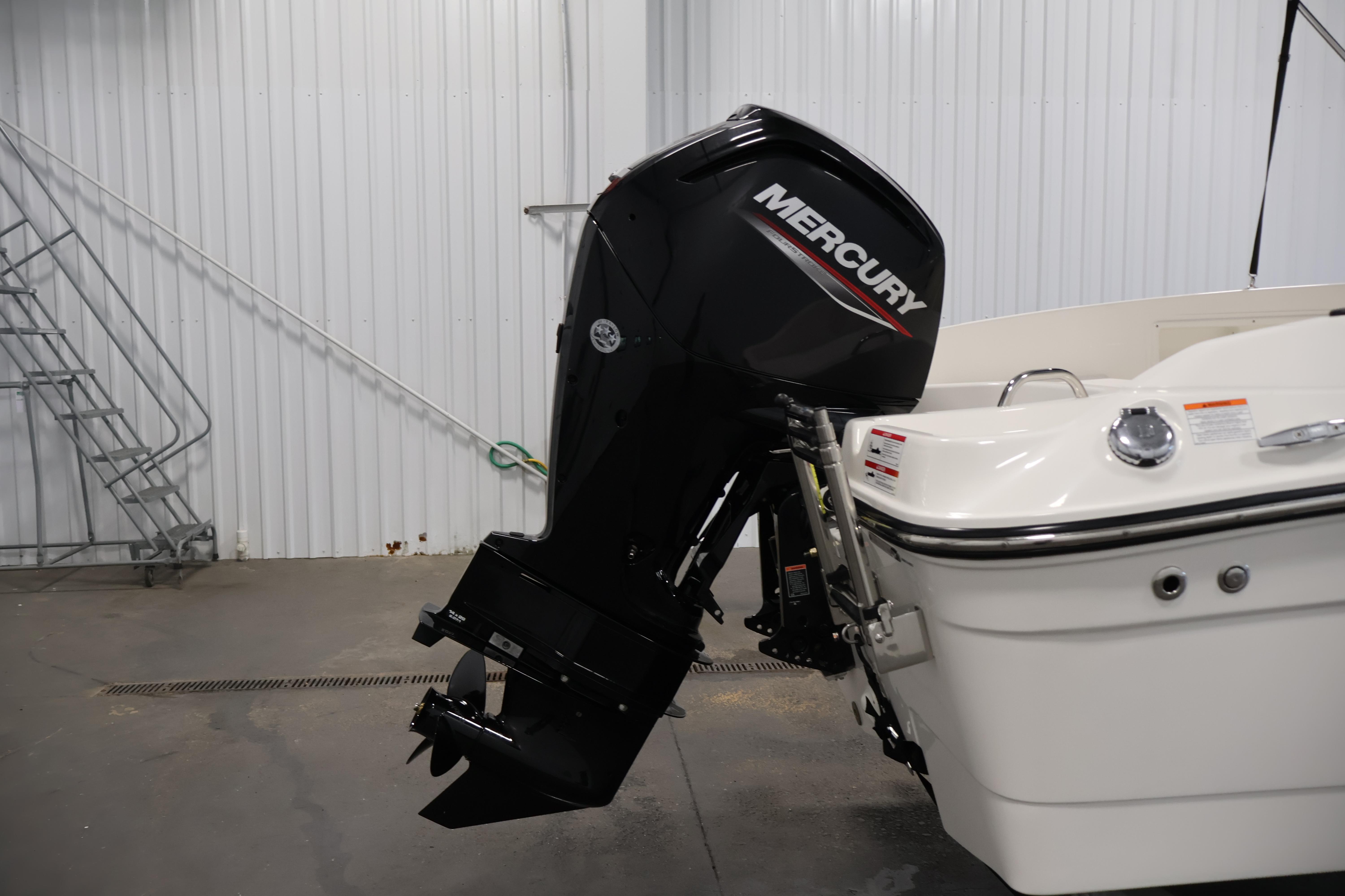 2026 Bayliner Trophy T18 with Mercury outboard motor in a garage setting.