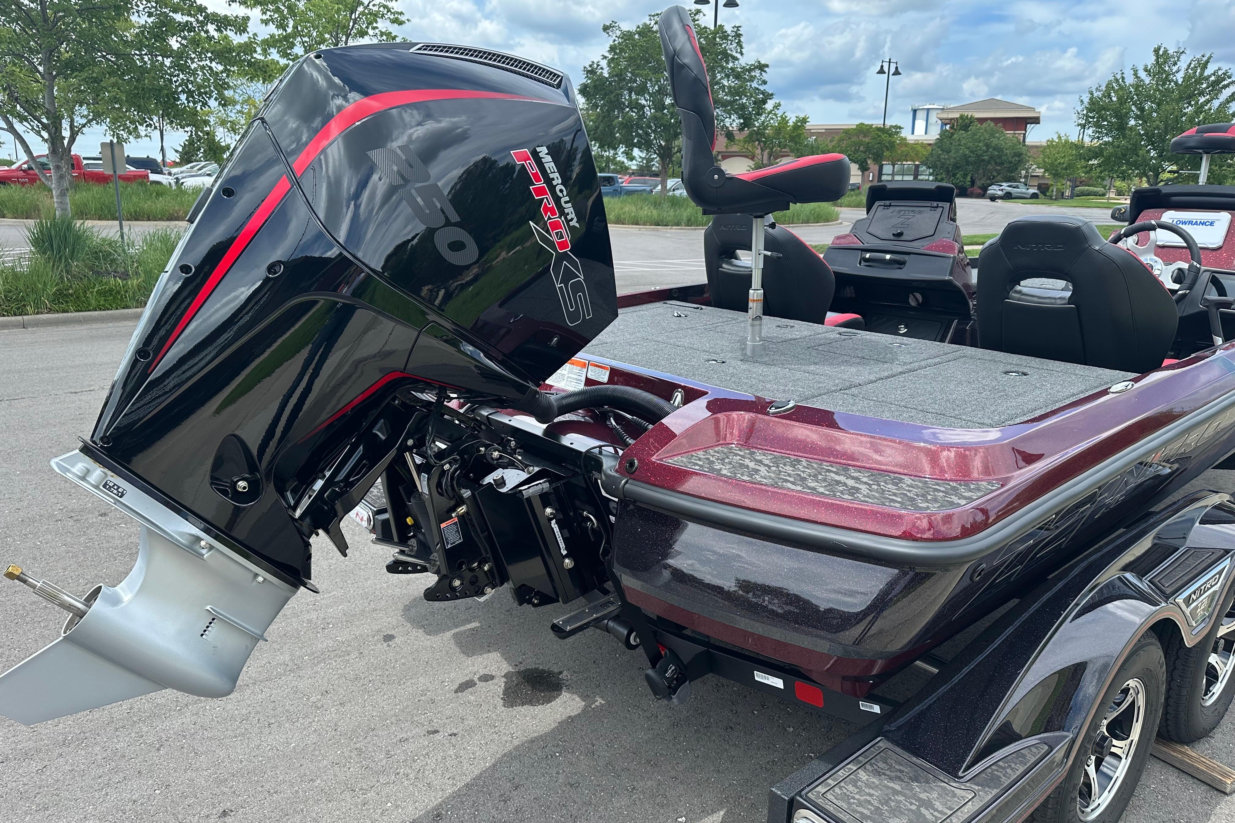 2026 Nitro Z21 XL boat with Mercury Pro XS engine, parked outdoors.