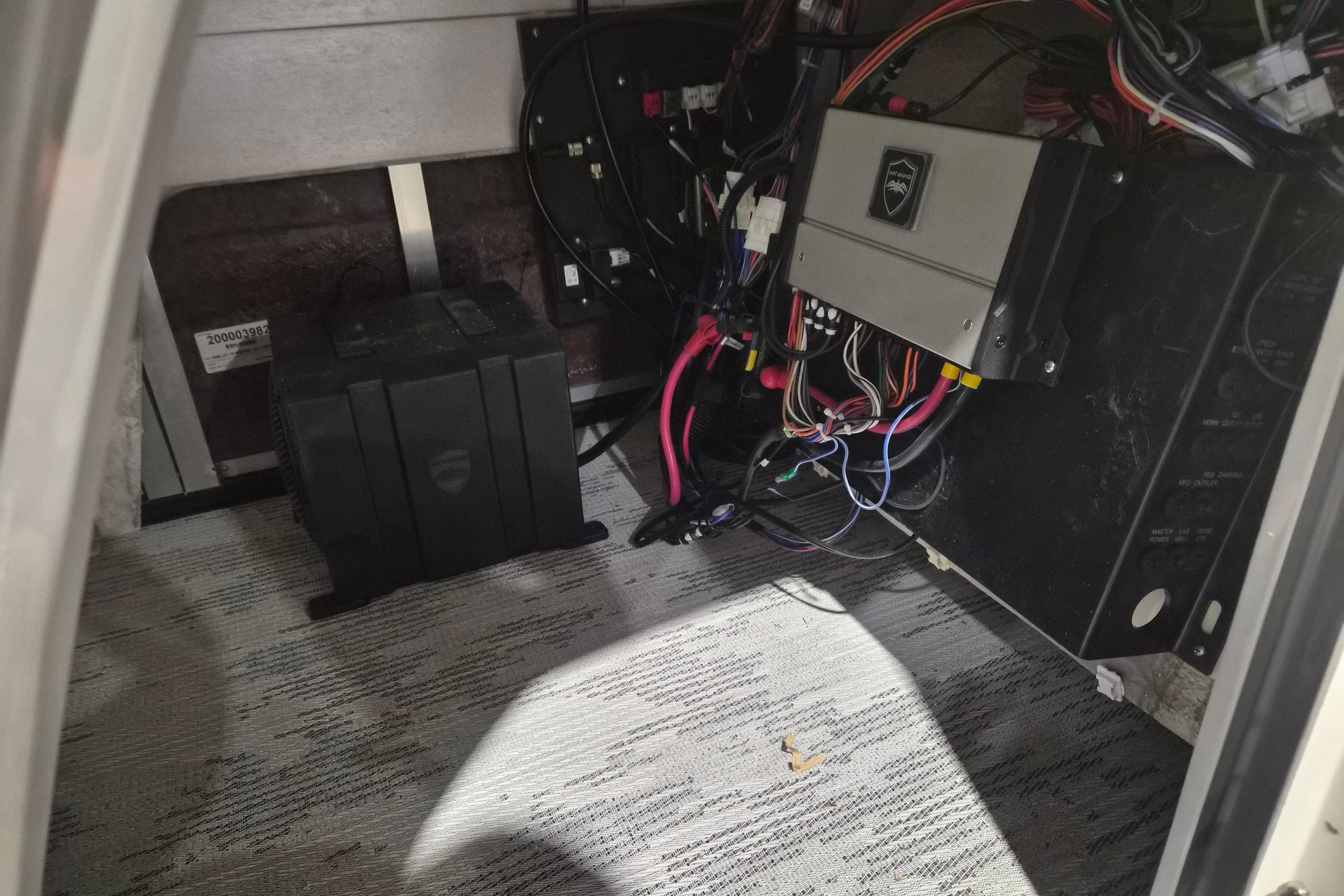 Electrical wiring and components inside a 2026 Sylvan L3 ULZ boat compartment.