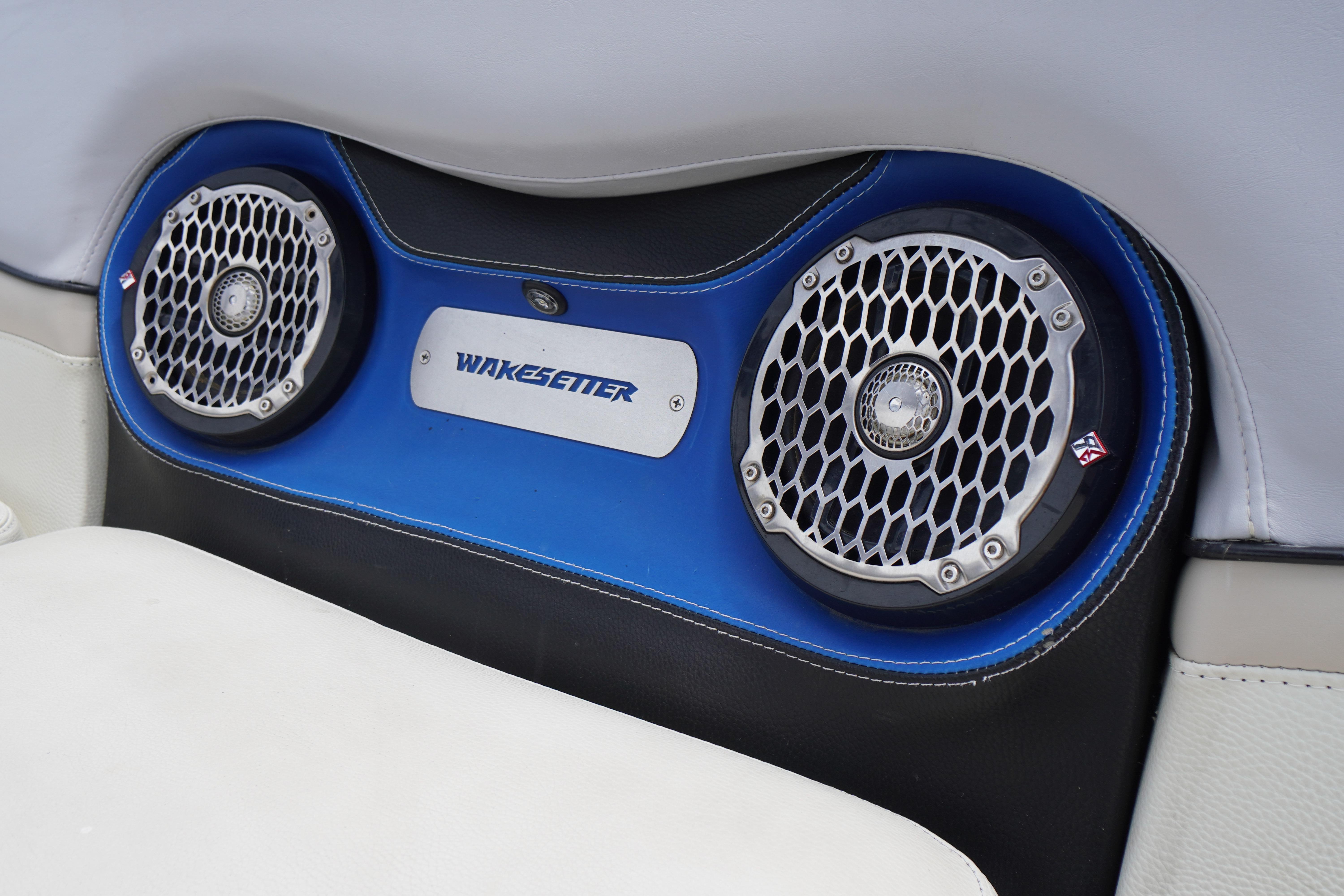 2011 Malibu Wakesetter 21 VLX boat speakers with blue and white interior design.