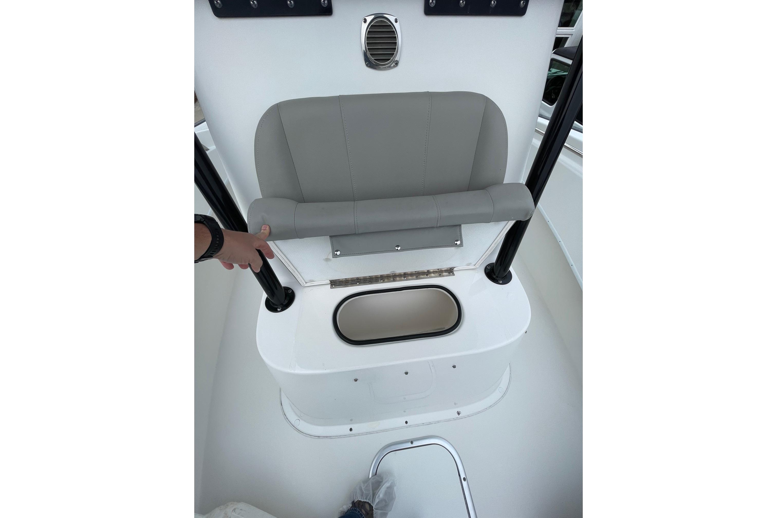 2023 Cape Horn 24 XS boat interior with seating and storage compartment.
