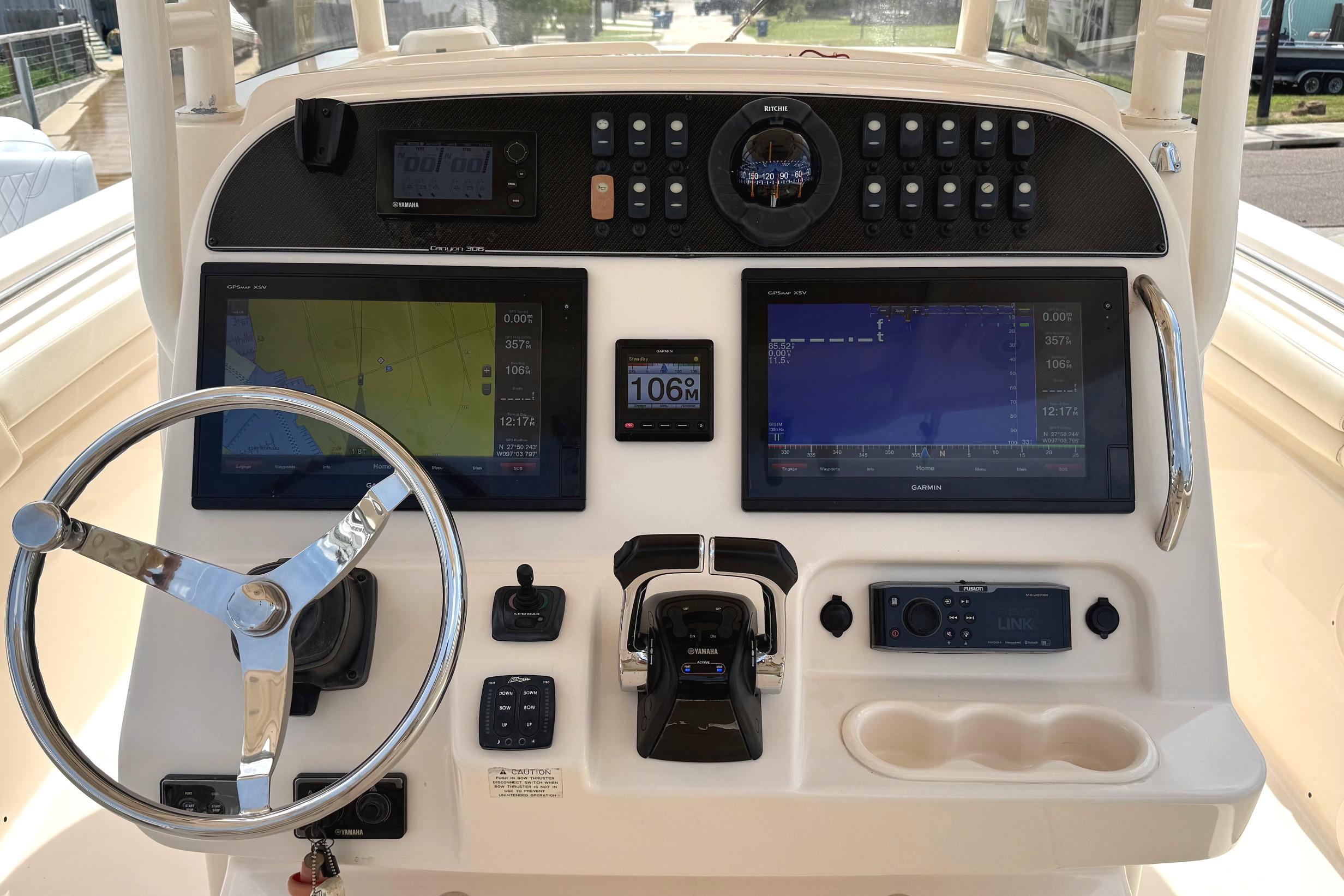 2018 Grady-White Canyon 306 helm with dual Garmin displays and Yamaha controls.