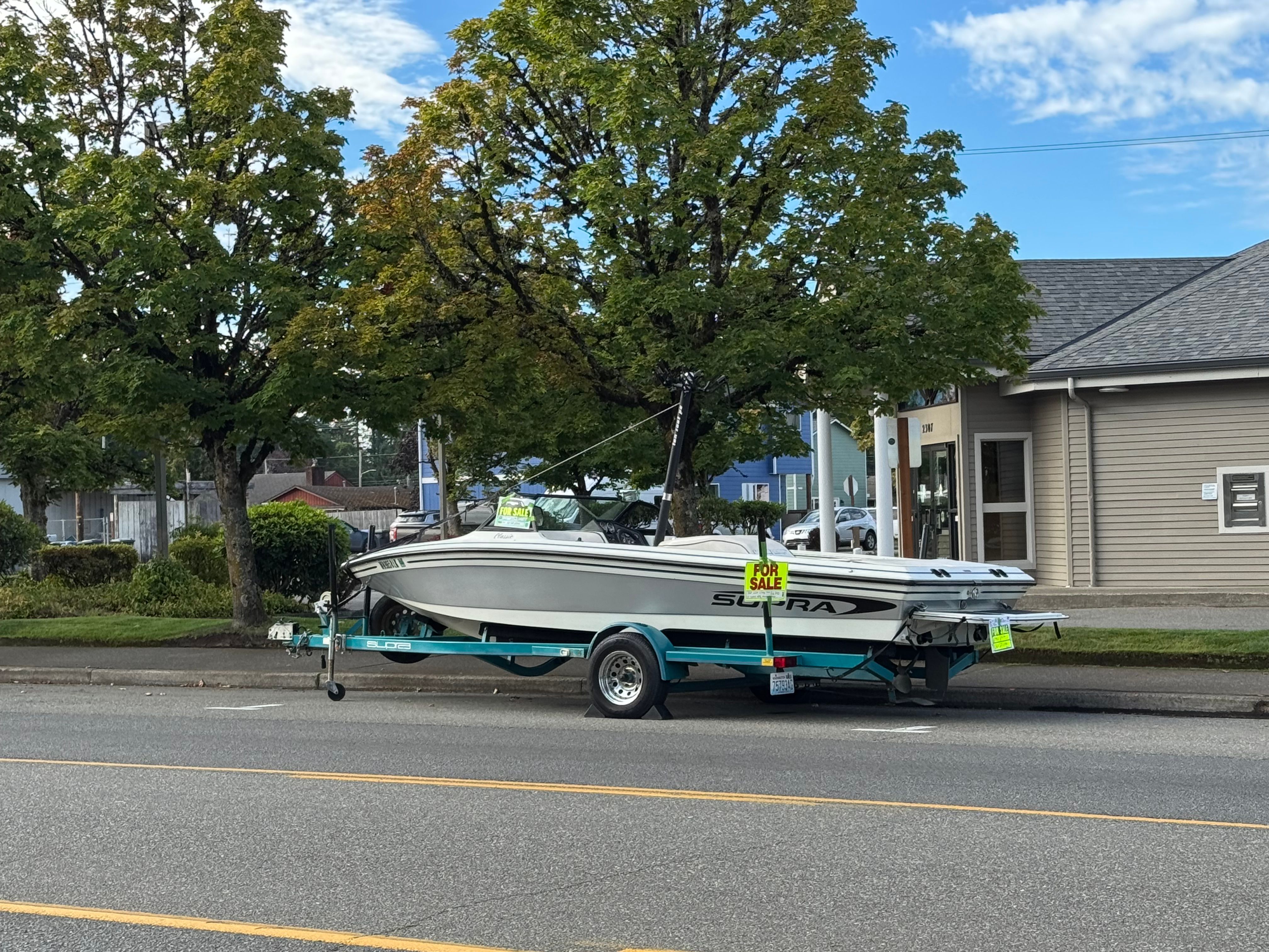 1990 Supra TS6M boat for sale on trailer.