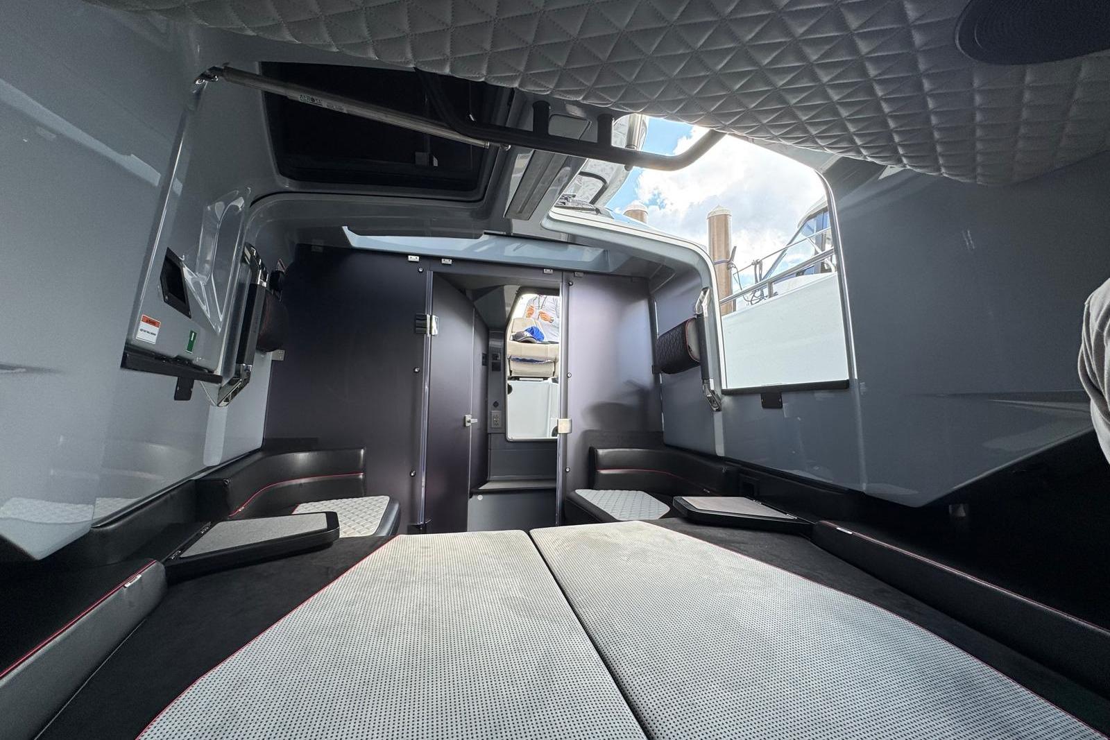Interior of 2023 BRABUS Shadow 900 ST luxury boat cabin with modern design.