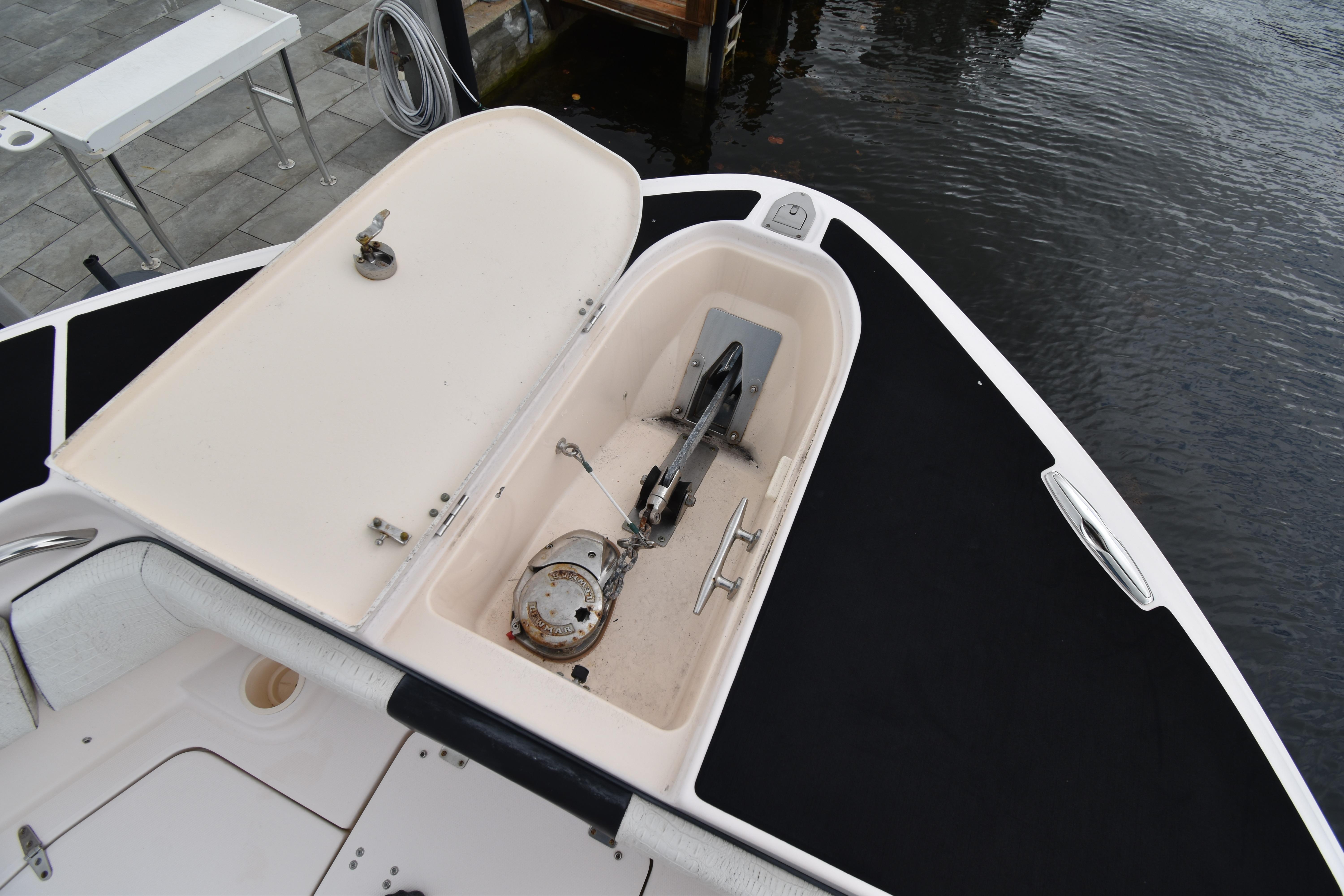 Open anchor compartment on 2010 Grady-White Canyon 366 boat at dockside.