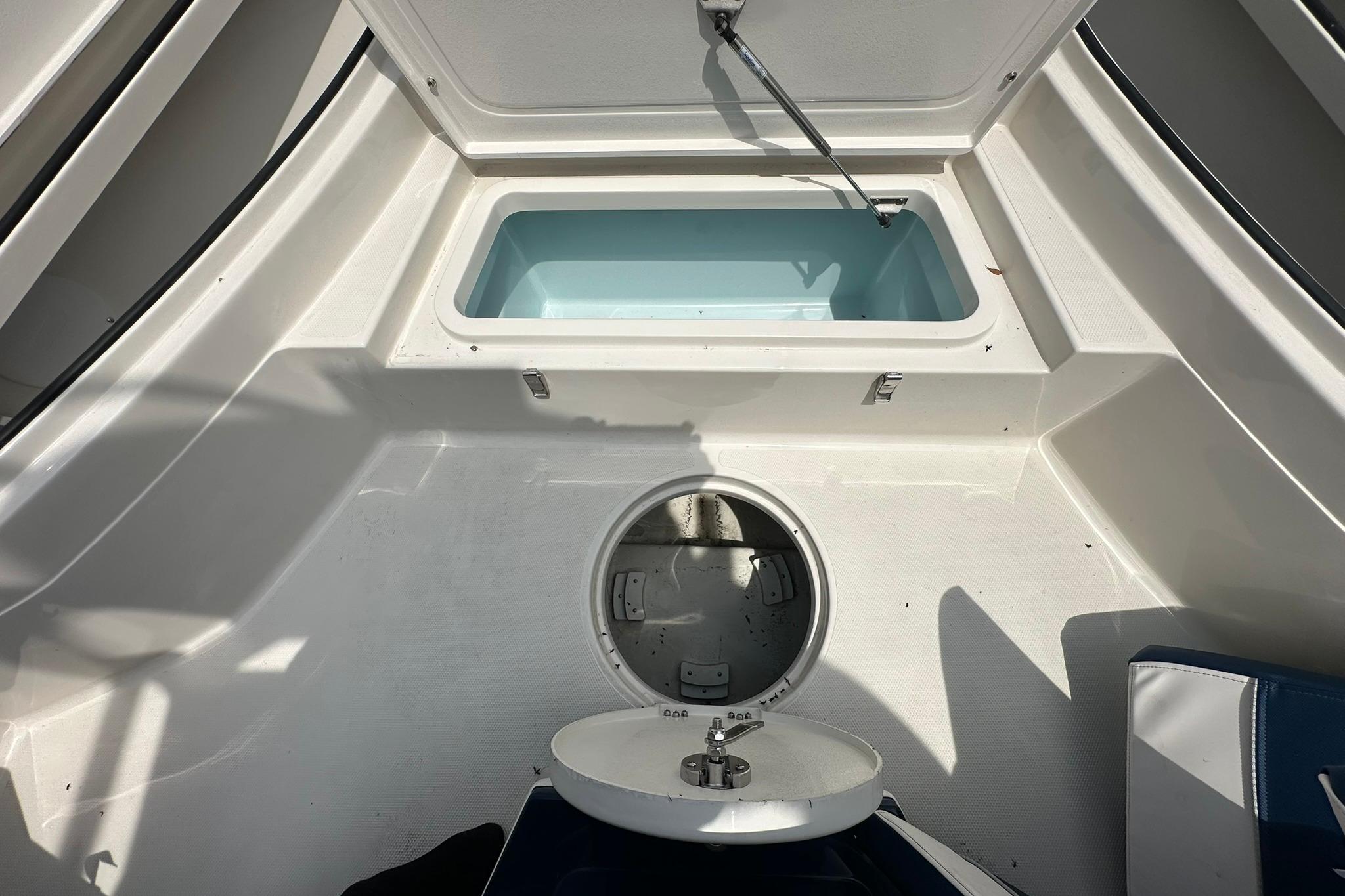 Interior view of 2026 Ranger 2660 Bay boat storage compartments.