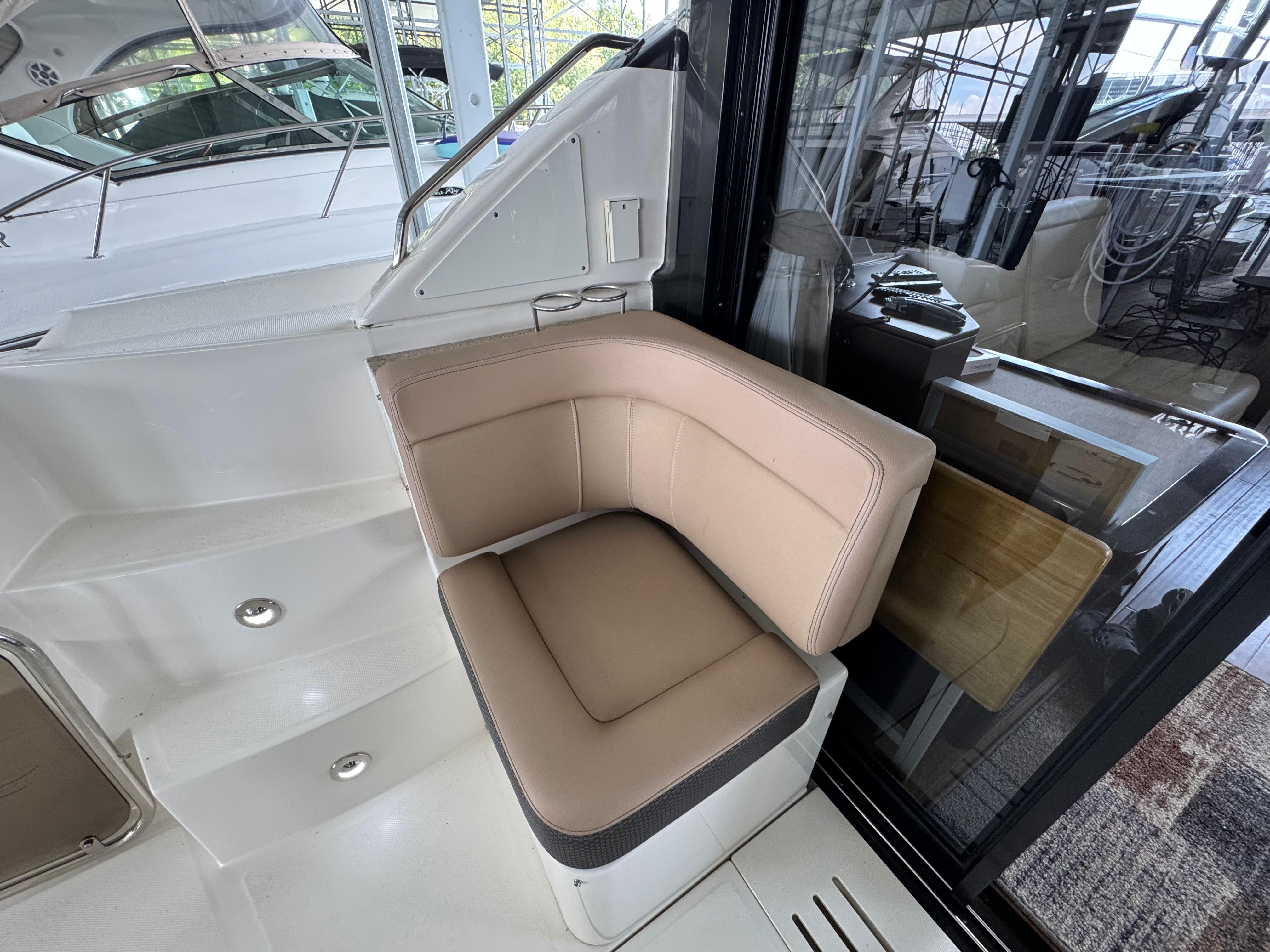 2017 Sea Ray Sundancer 400 interior with beige seating and modern design.