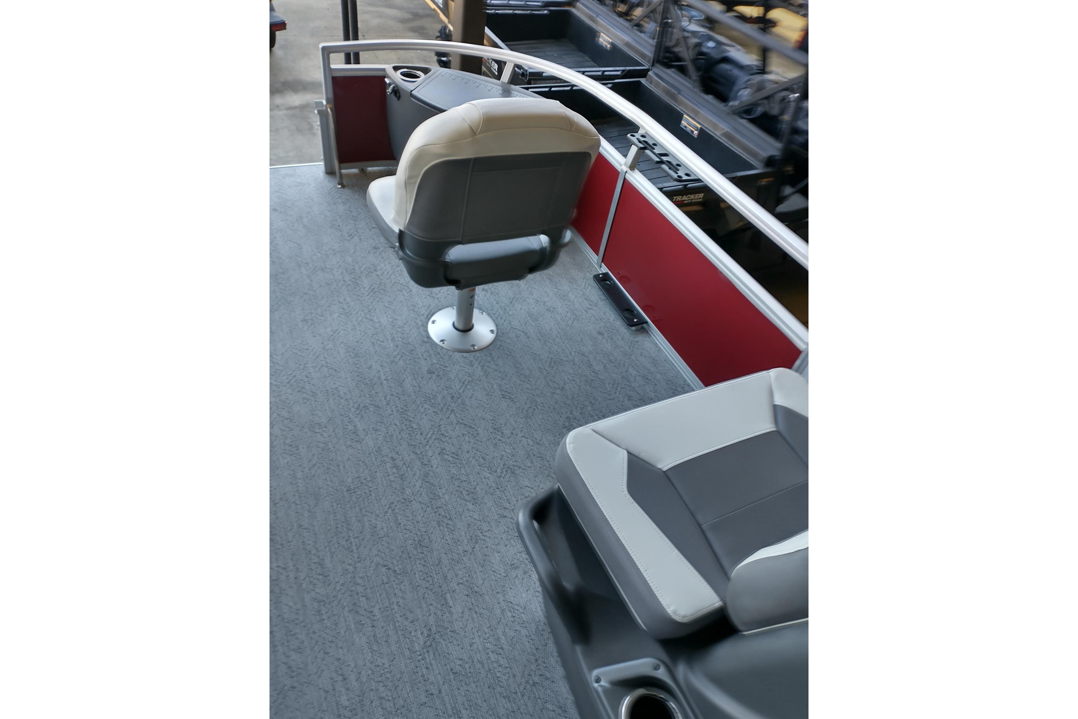 2026 Sun Tracker Bass Buggy 18 DLX interior with seating and railing.