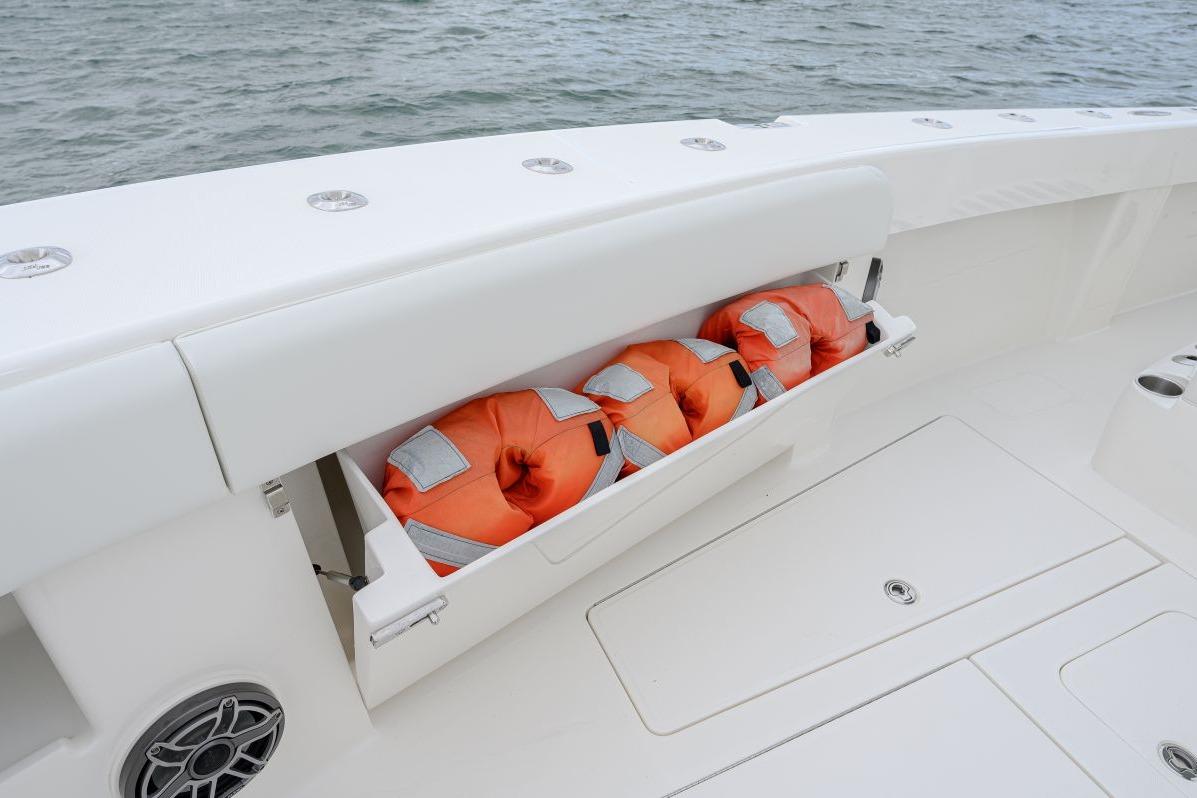 2024 SeaVee 370Z boat with life jackets stored in a compartment.