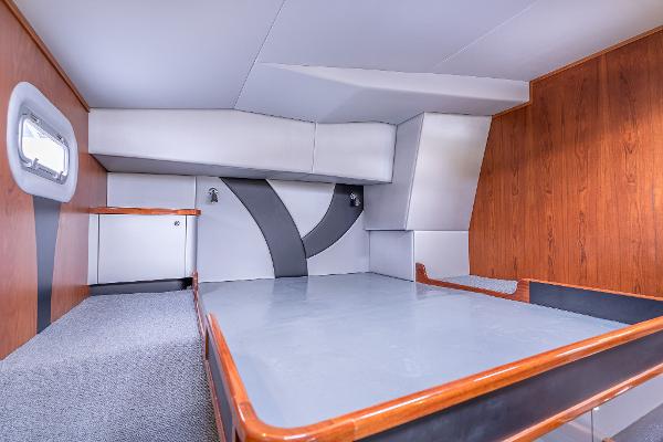 Interior of 2025 Shuttleworth 52 AeroRig yacht, featuring modern design and wood accents.