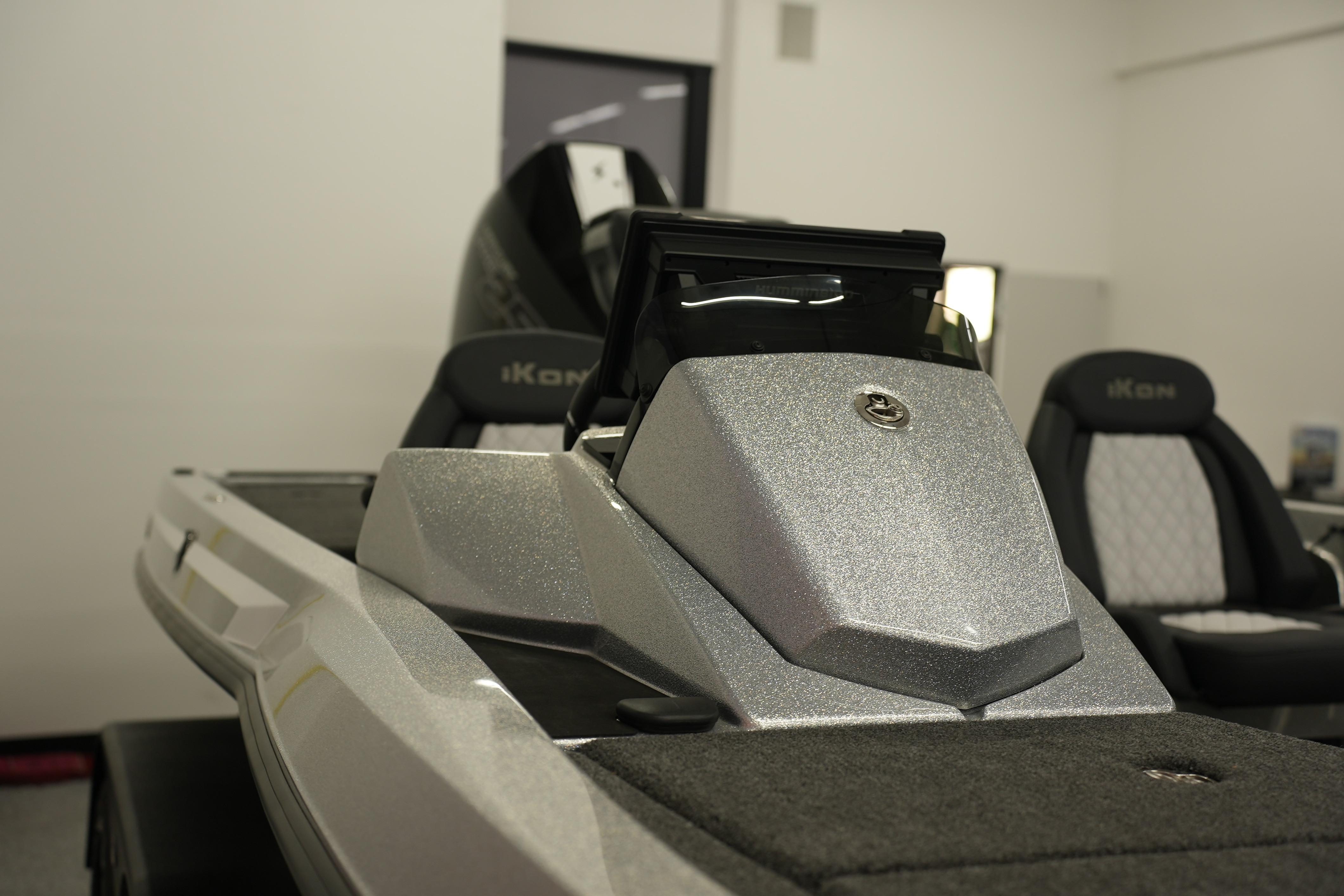 2026 iKon LXE20 boat interior with sleek silver dashboard and modern seating.