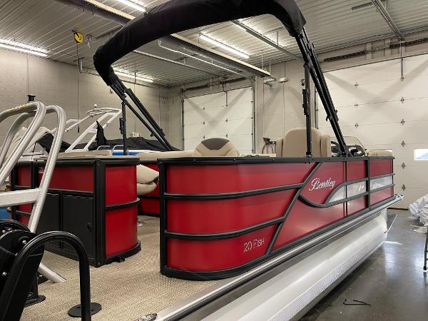 2025 Bentley Pontoons 200 Fish-N-Cruise in a showroom, featuring a sleek red design.