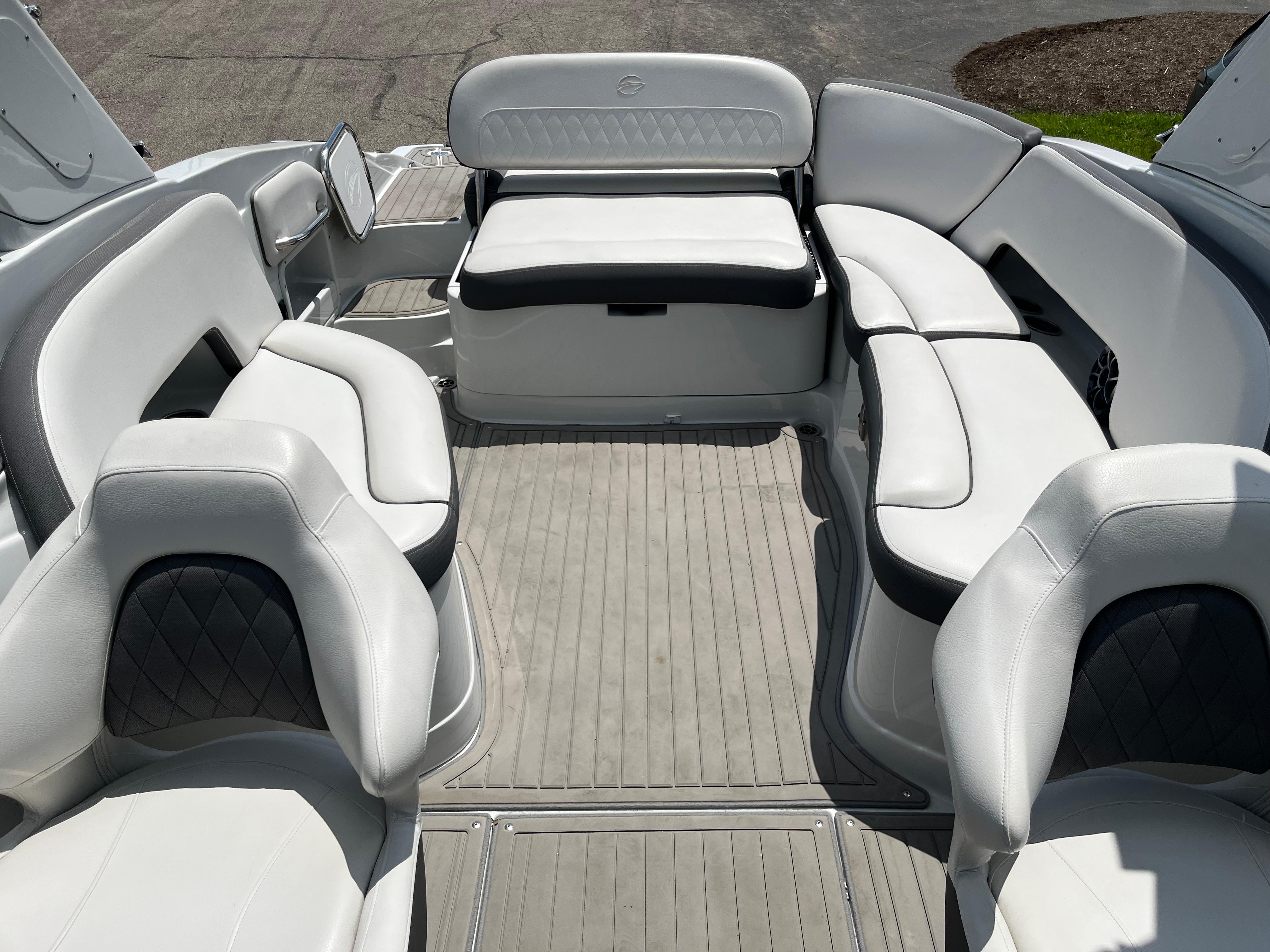 2022 Crownline 280 SS boat interior with white leather seating and modern design.