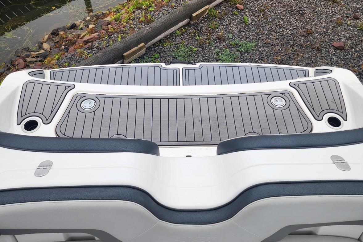 Yamaha Boats 2015 212X swim platform with sleek gray decking and black accents.