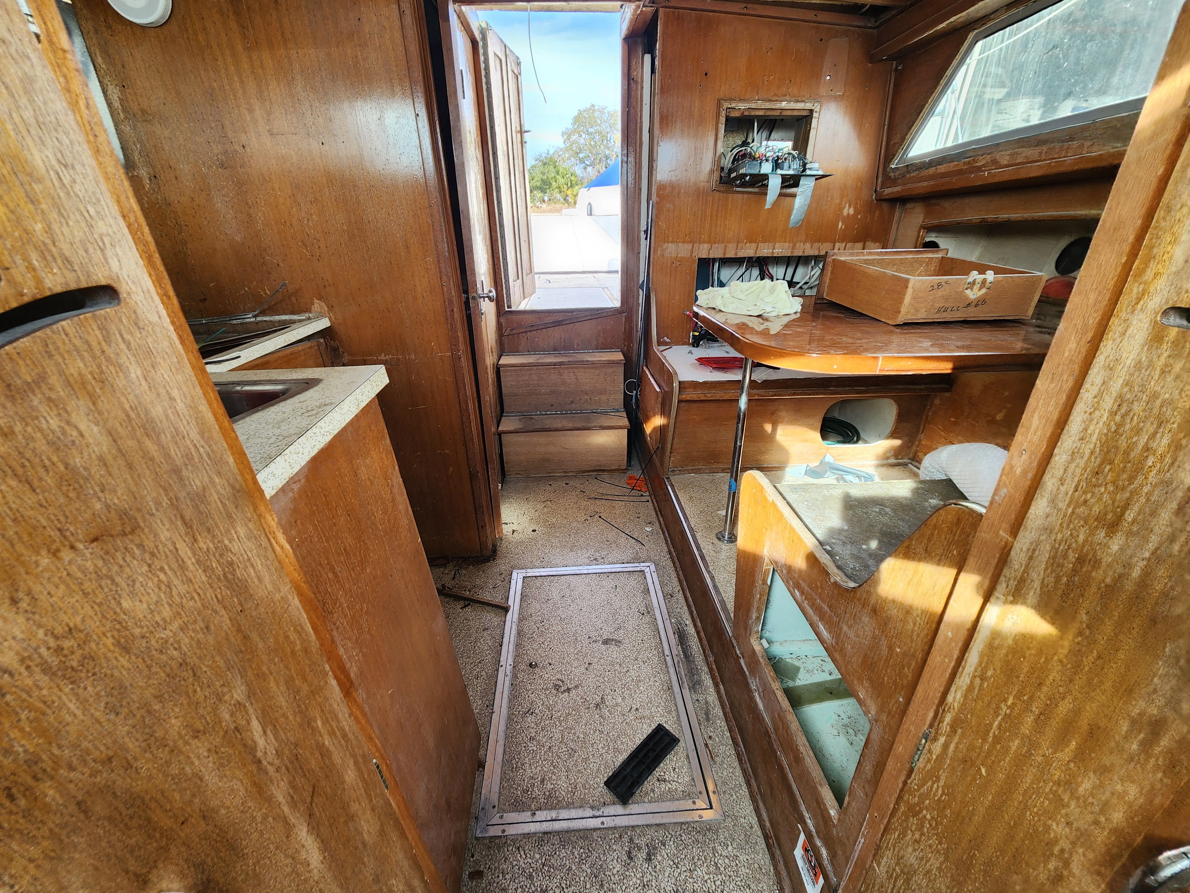 Interior of a 1967 Hatteras 28ft yacht with wooden fittings.