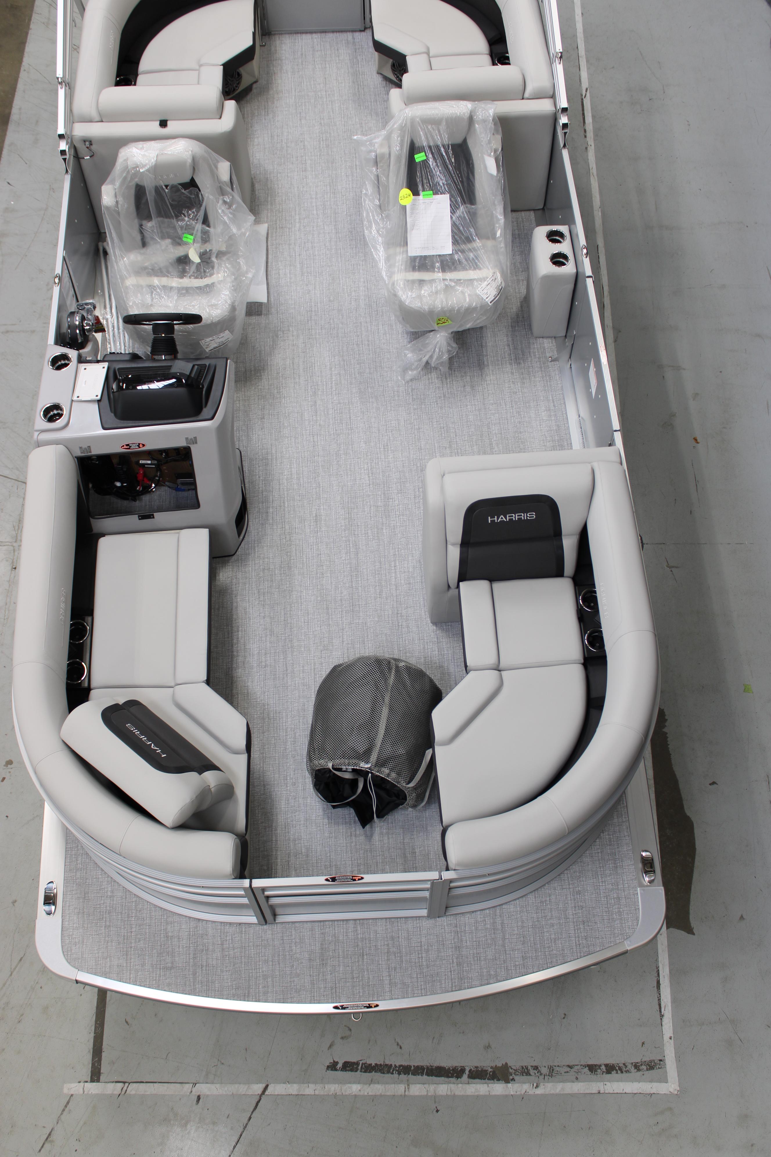2025 Harris Cruiser 210 pontoon boat interior with gray seating and modern design.