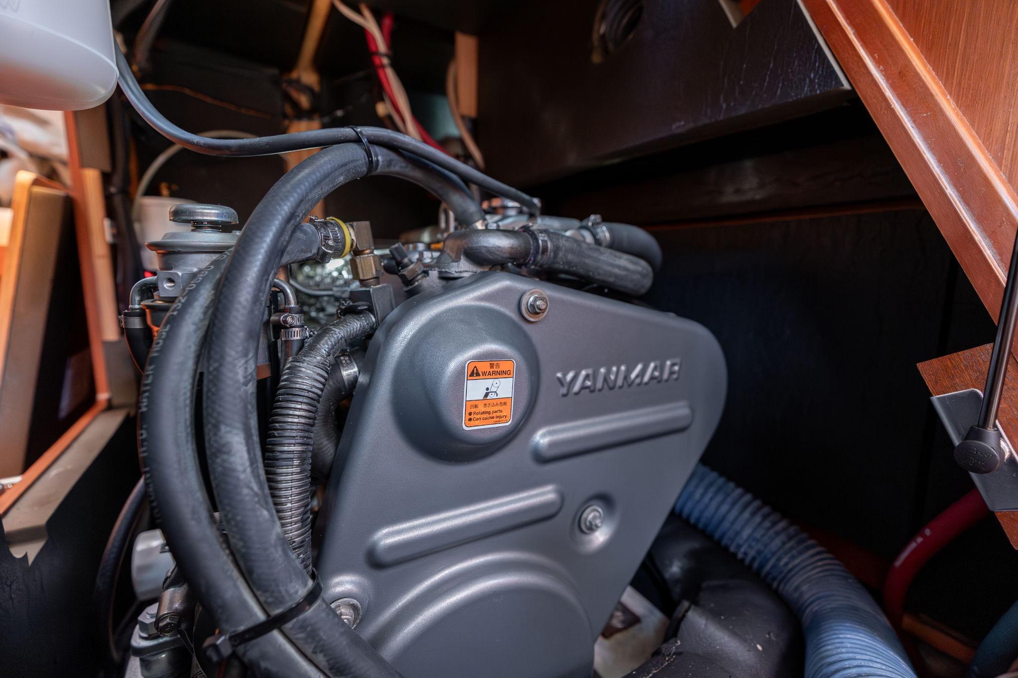 Yanmar engine inside a 2013 Beneteau Oceanis 50 sailboat, showcasing mechanical components.