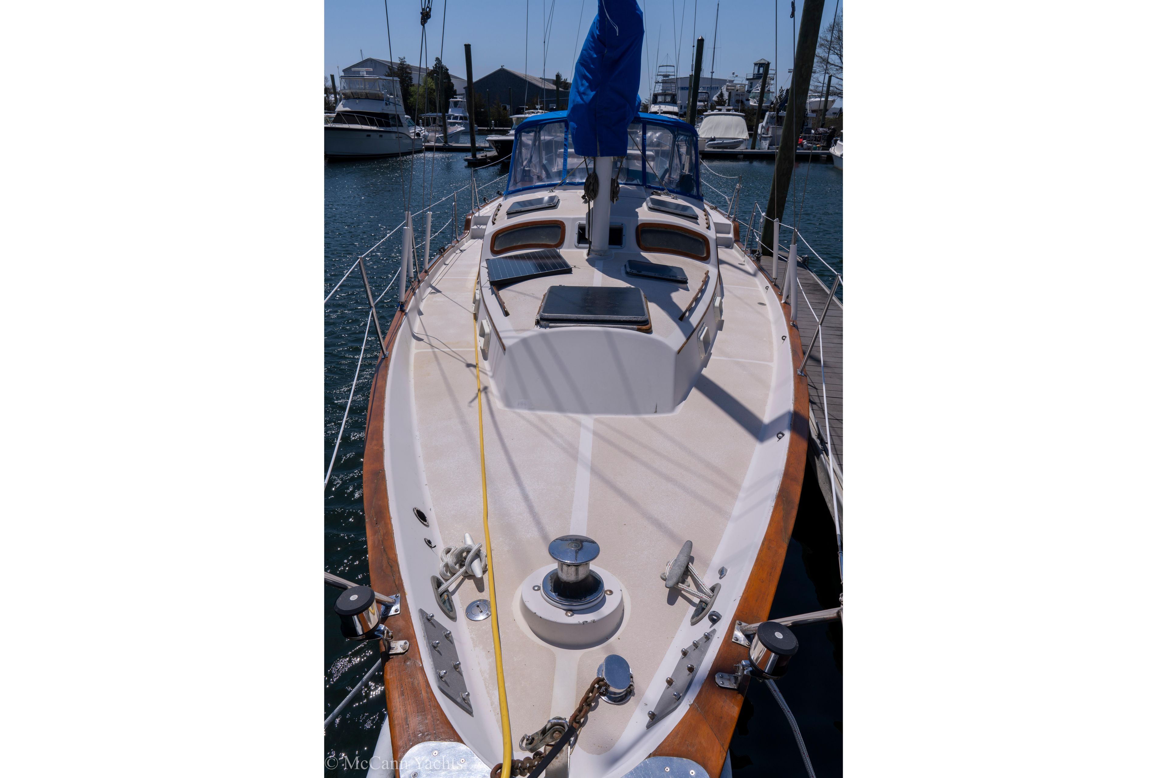 1980 Irwin 46 sailboat docked at marina, showcasing deck and rigging.