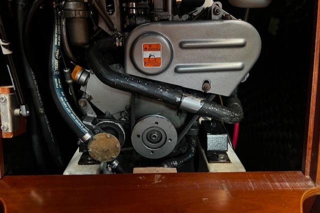 Engine compartment of a 2006 Beneteau 343 Sloop sailboat, showcasing mechanical components.