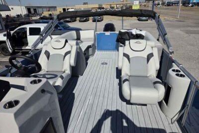 2026 SunCatcher Select 322RC pontoon boat with luxurious seating and modern design.