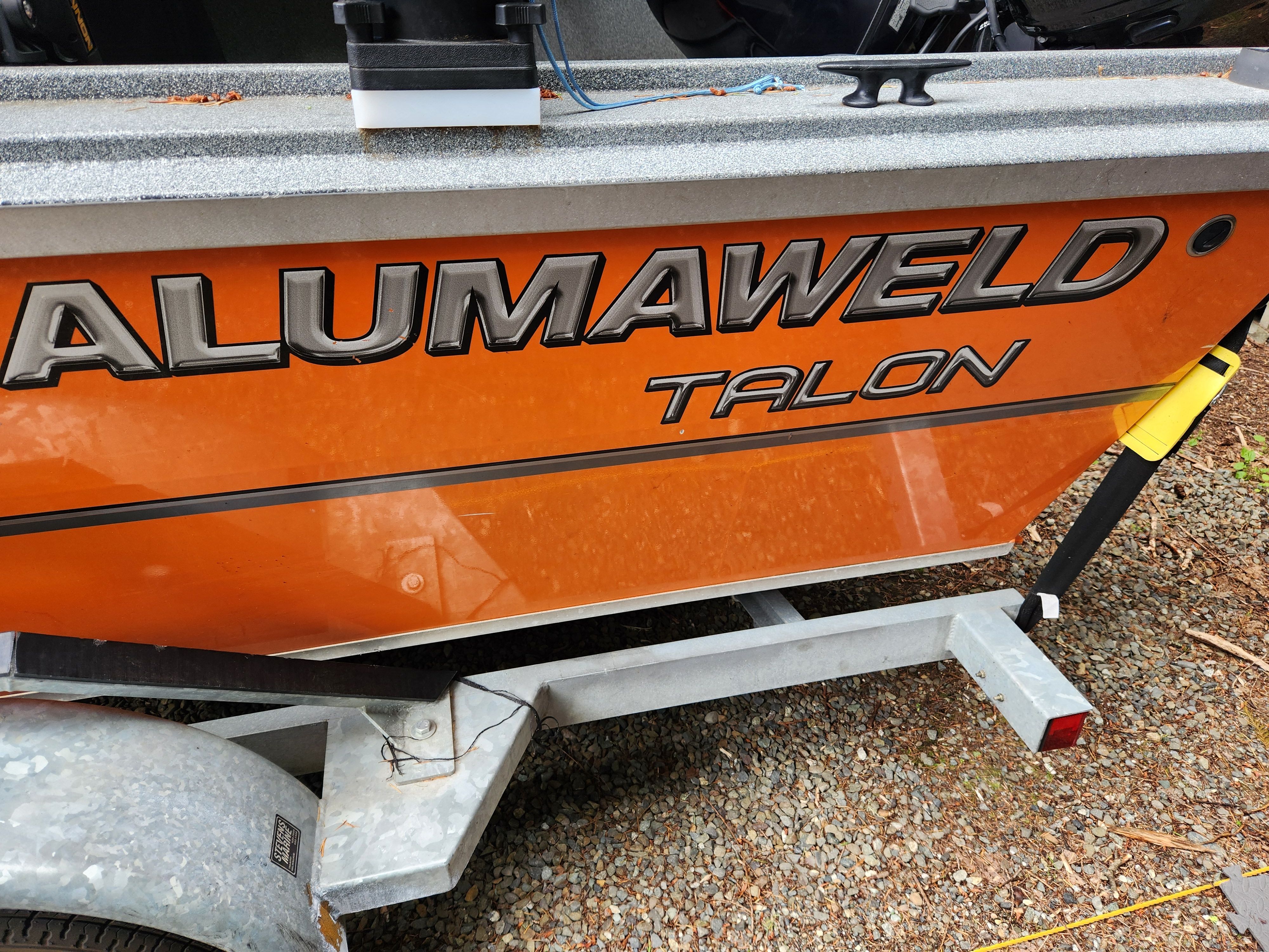 2020 Alumaweld Talon 18 boat on trailer, orange finish.