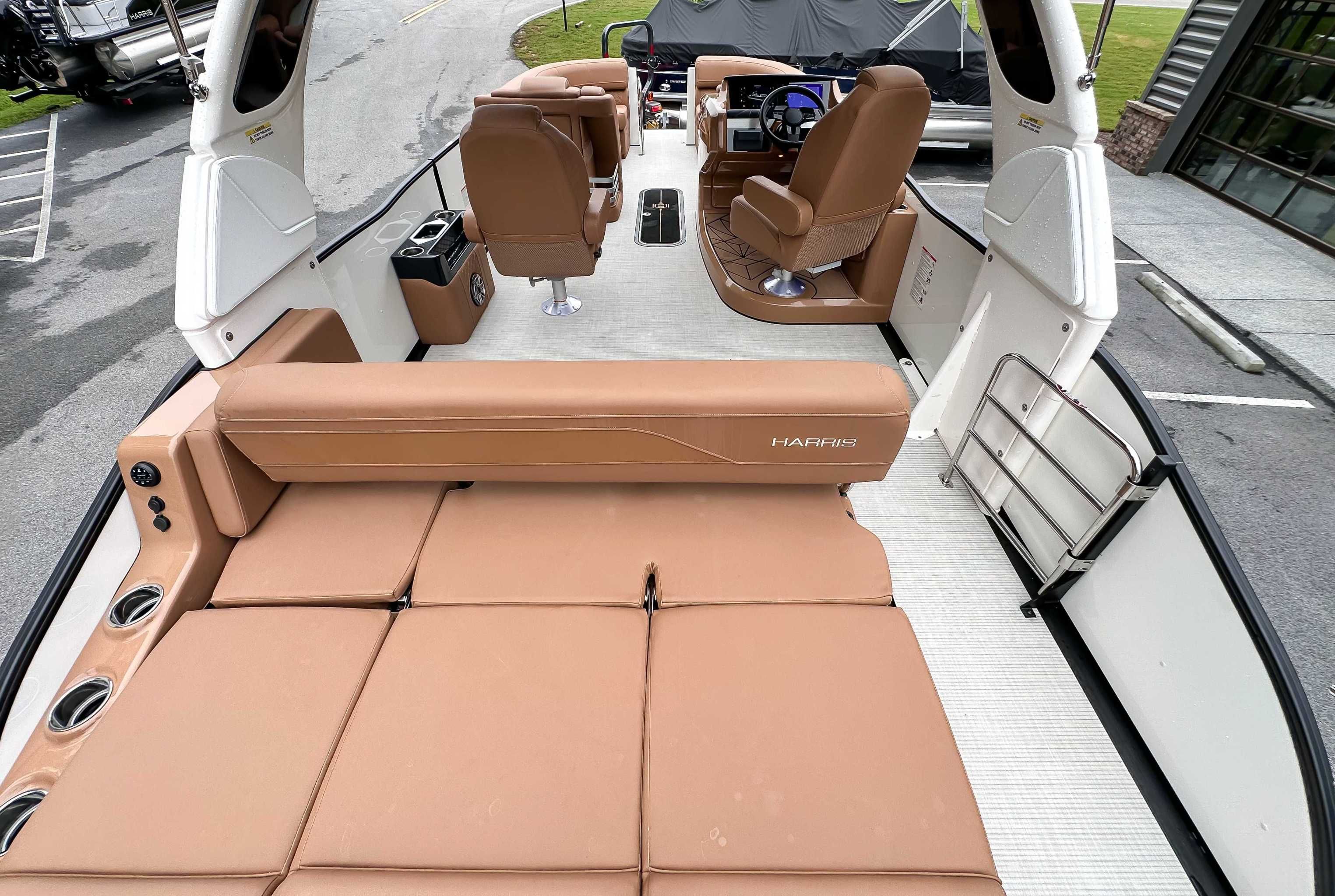Interior of 2025 Harris Grand Mariner 230 SLDH with luxurious seating.