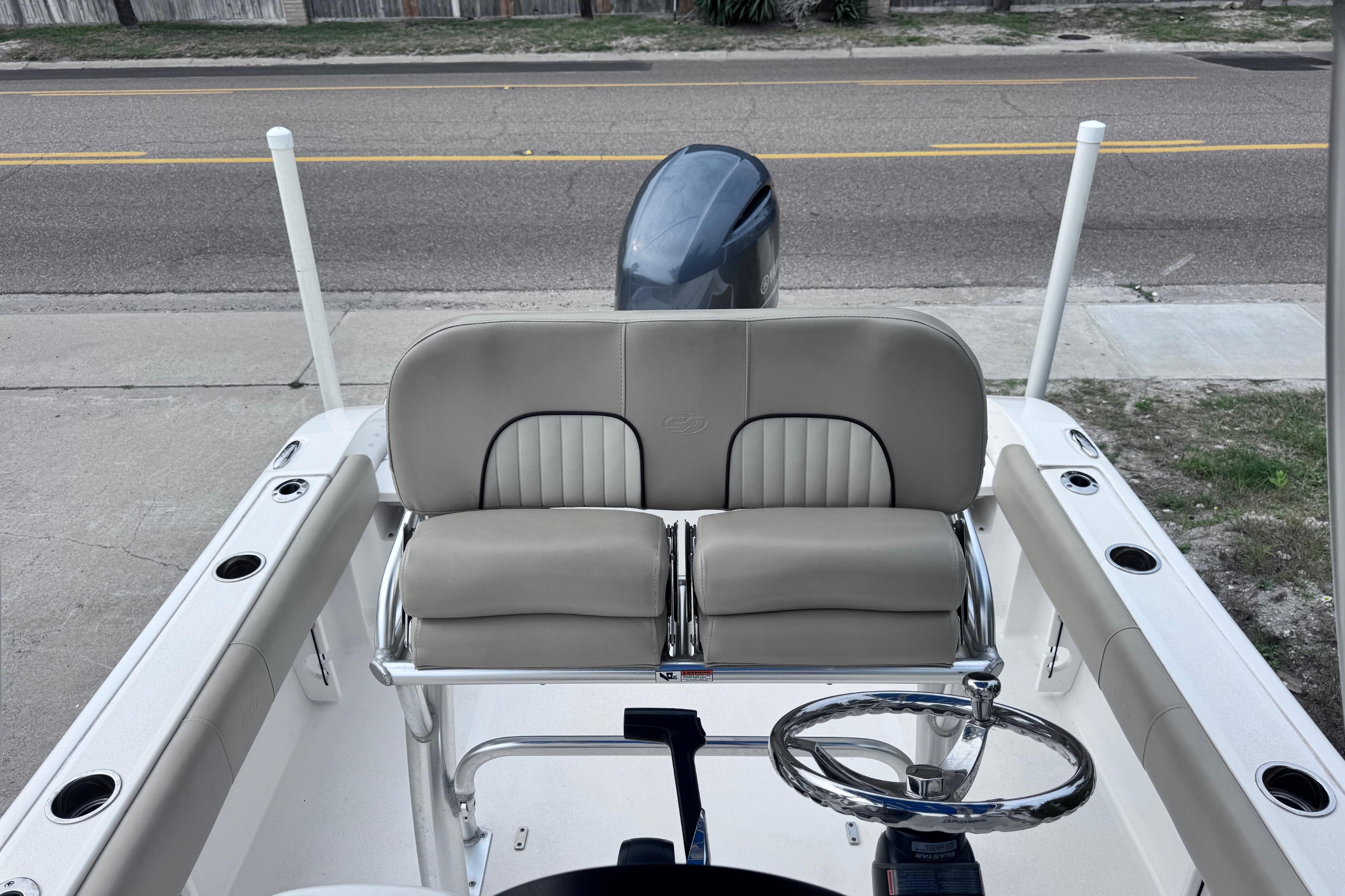 2018 Sea Fox 206 Commander boat interior with seating and steering wheel.